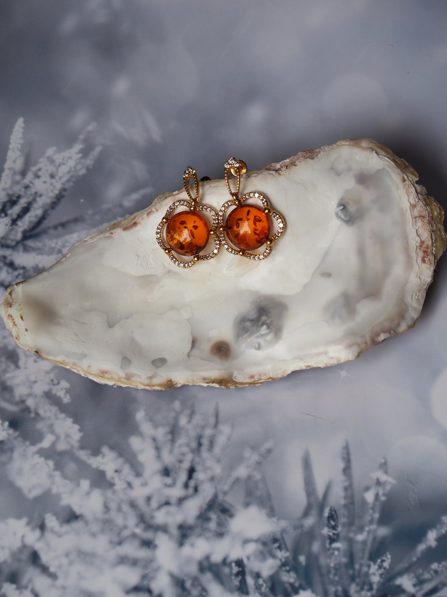 Delicate Flower Shaped Cognac Amber Earrings with Cubic Zirconia in Gold Plated Silver