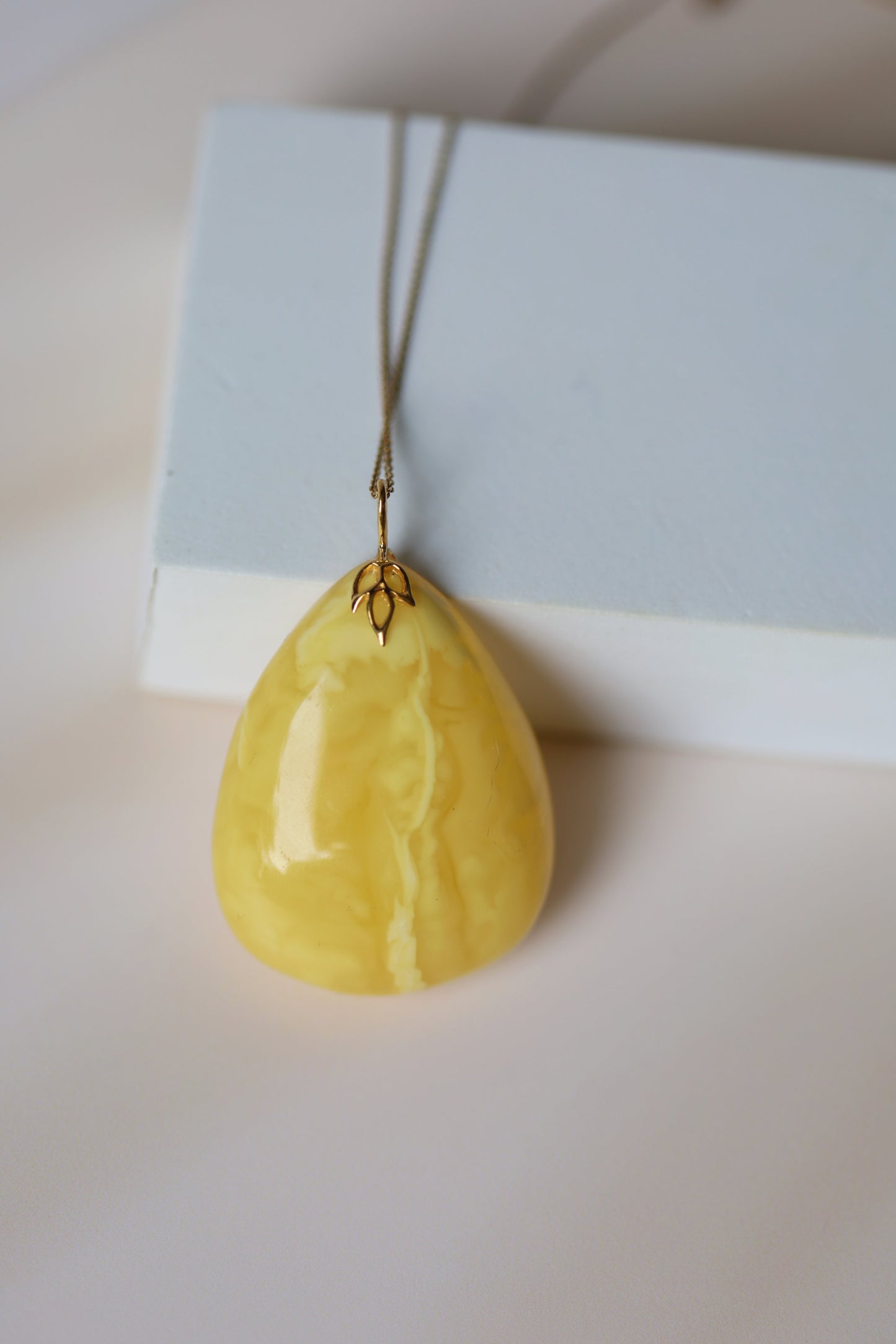 Natural Milk Amber Teardrop Shape Pendant in 14 Carat Gold
