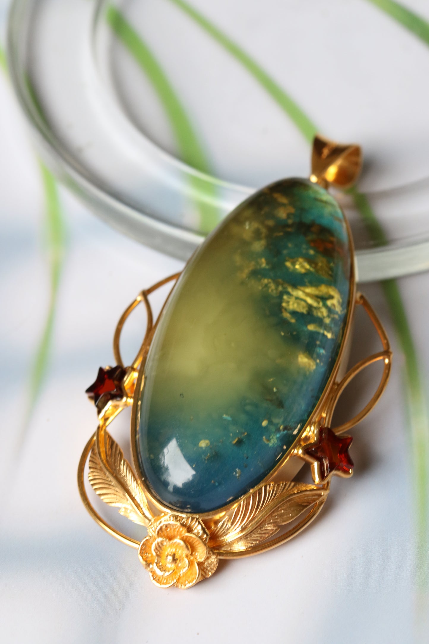 Large Unique Blue Amber Pendant with Milk Cloudy Inclusion and Cognac Stars in Gold Plated Silver