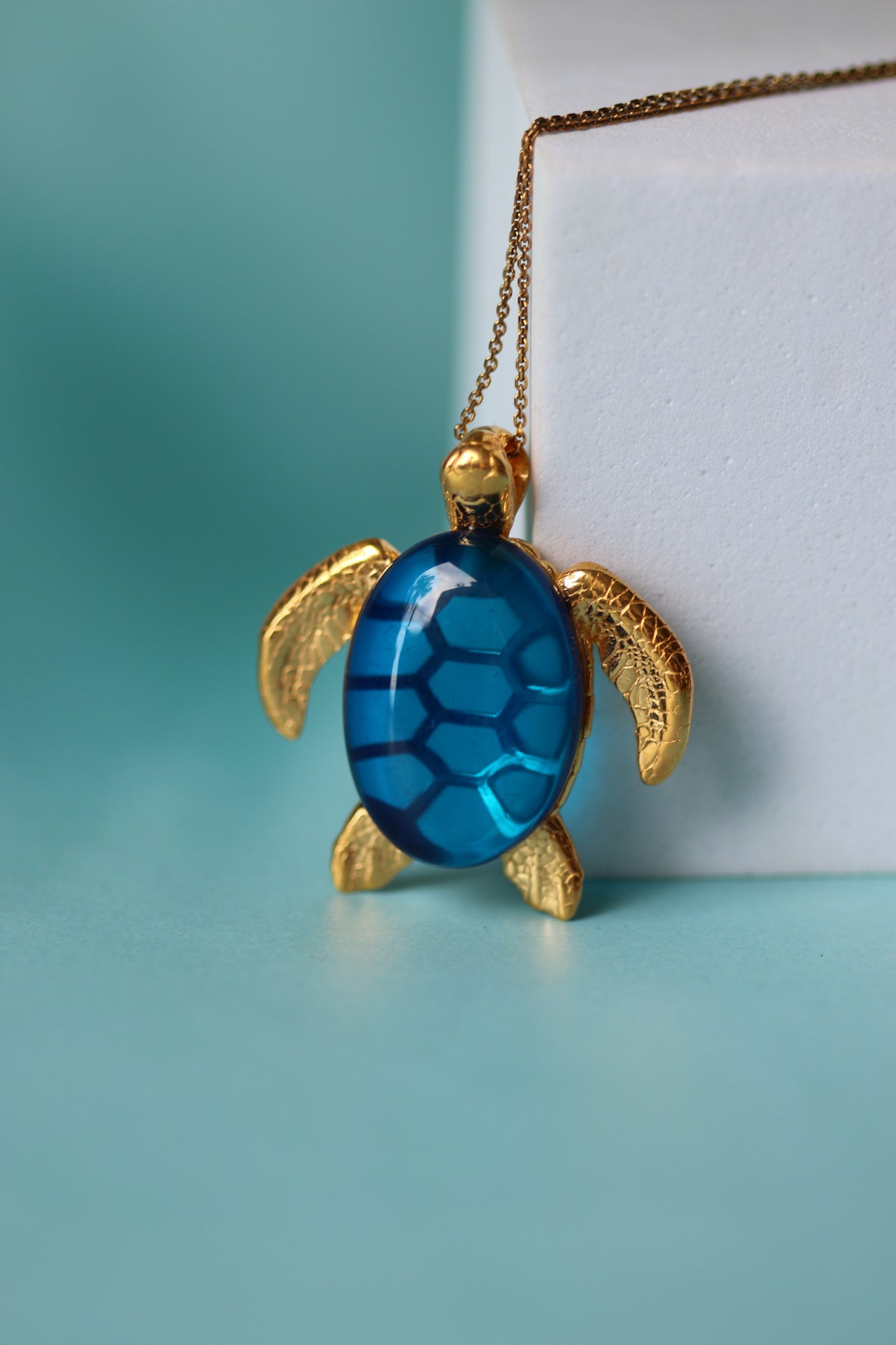 Blue Amber Turtle Shape Pendant in Gold Plated Silver