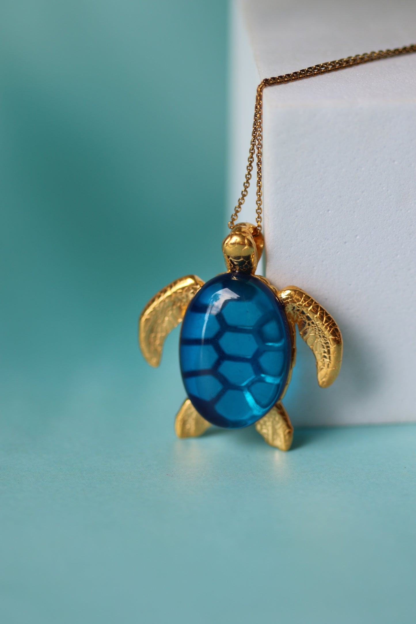 Blue Amber Turtle Shape Pendant in Gold Plated Silver