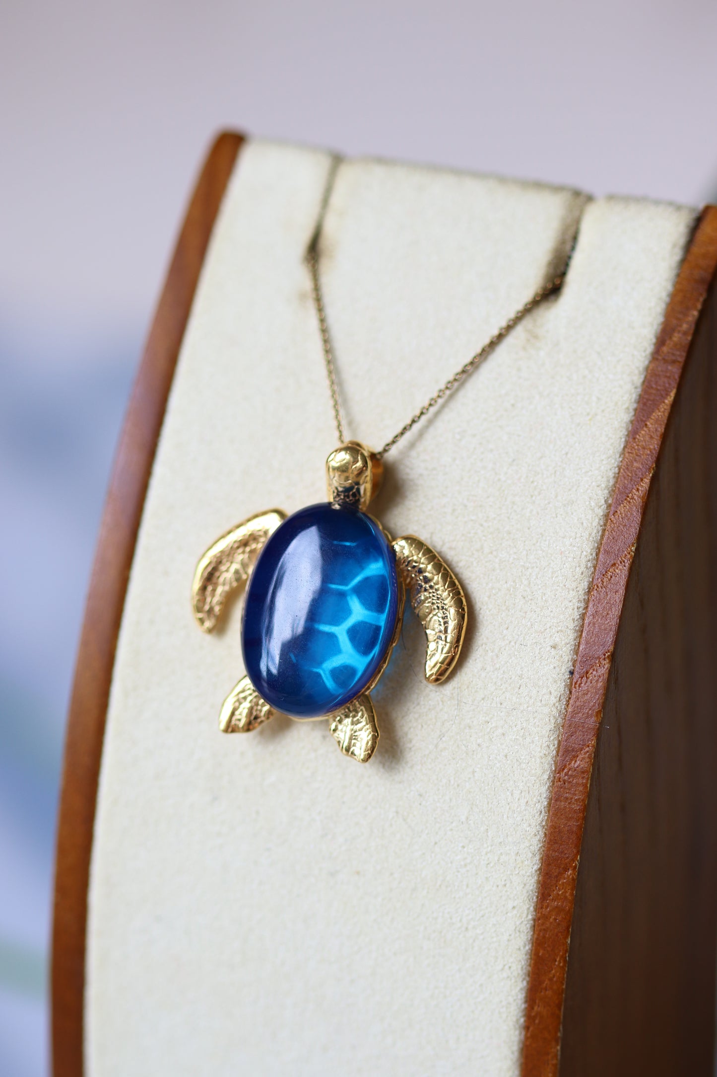 Blue Amber Turtle Shape Pendant in Gold Plated Silver