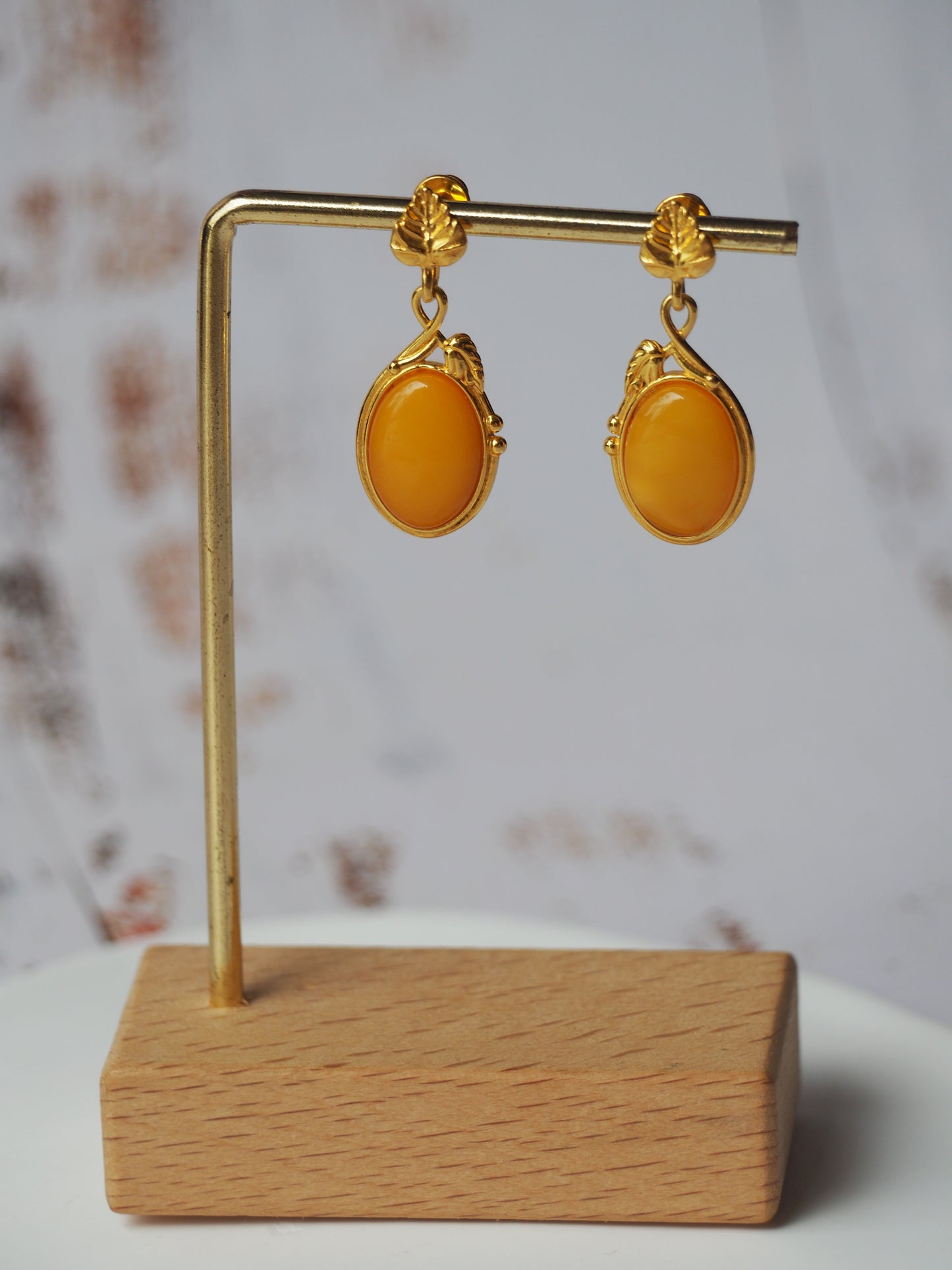 Honey Amber Oval Shape Dangling Earrings in Gold Plated Silver 925