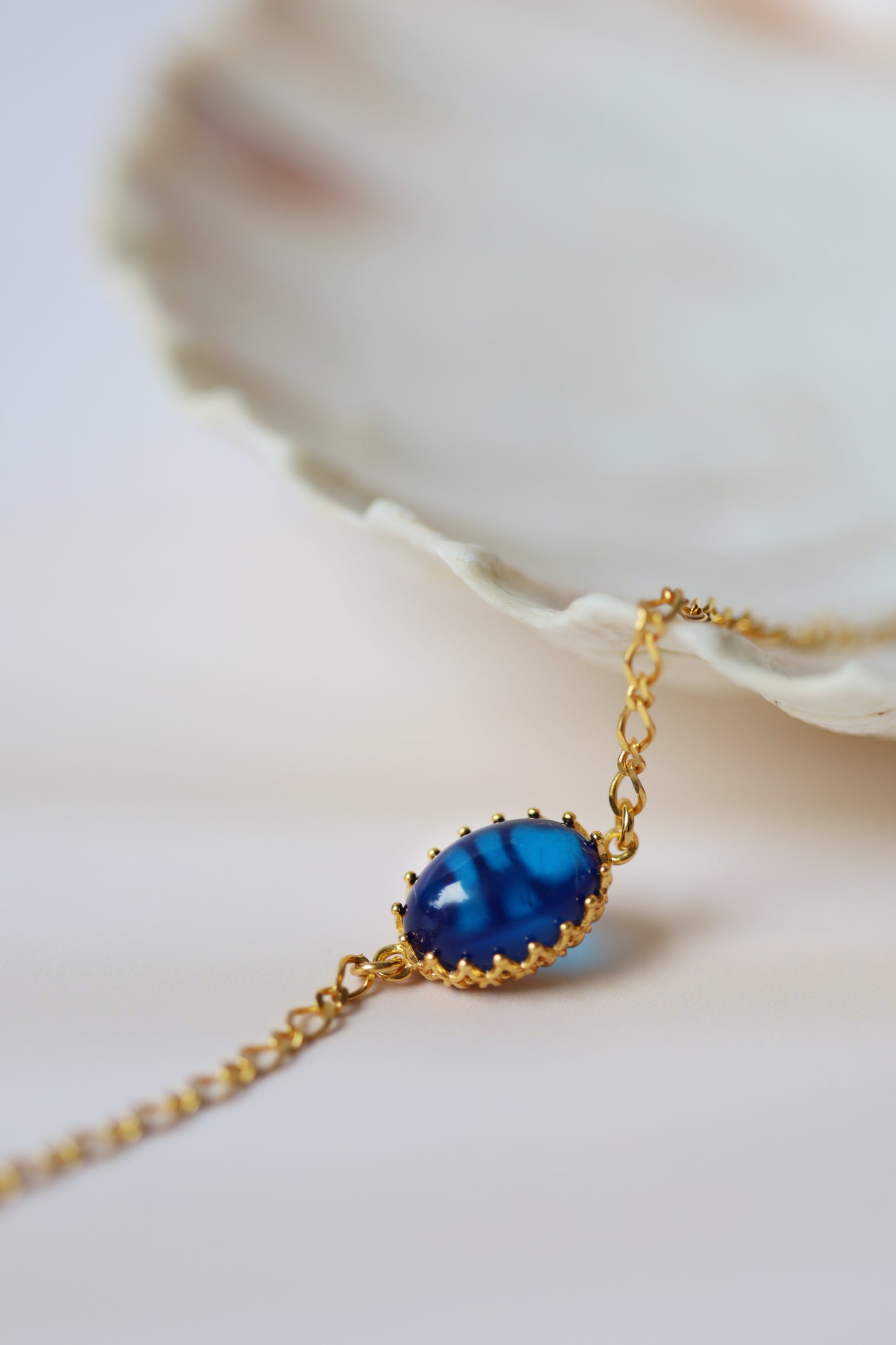 Olive Shape Blue Amber Chain Bracelet in Gold Plated Silver 925