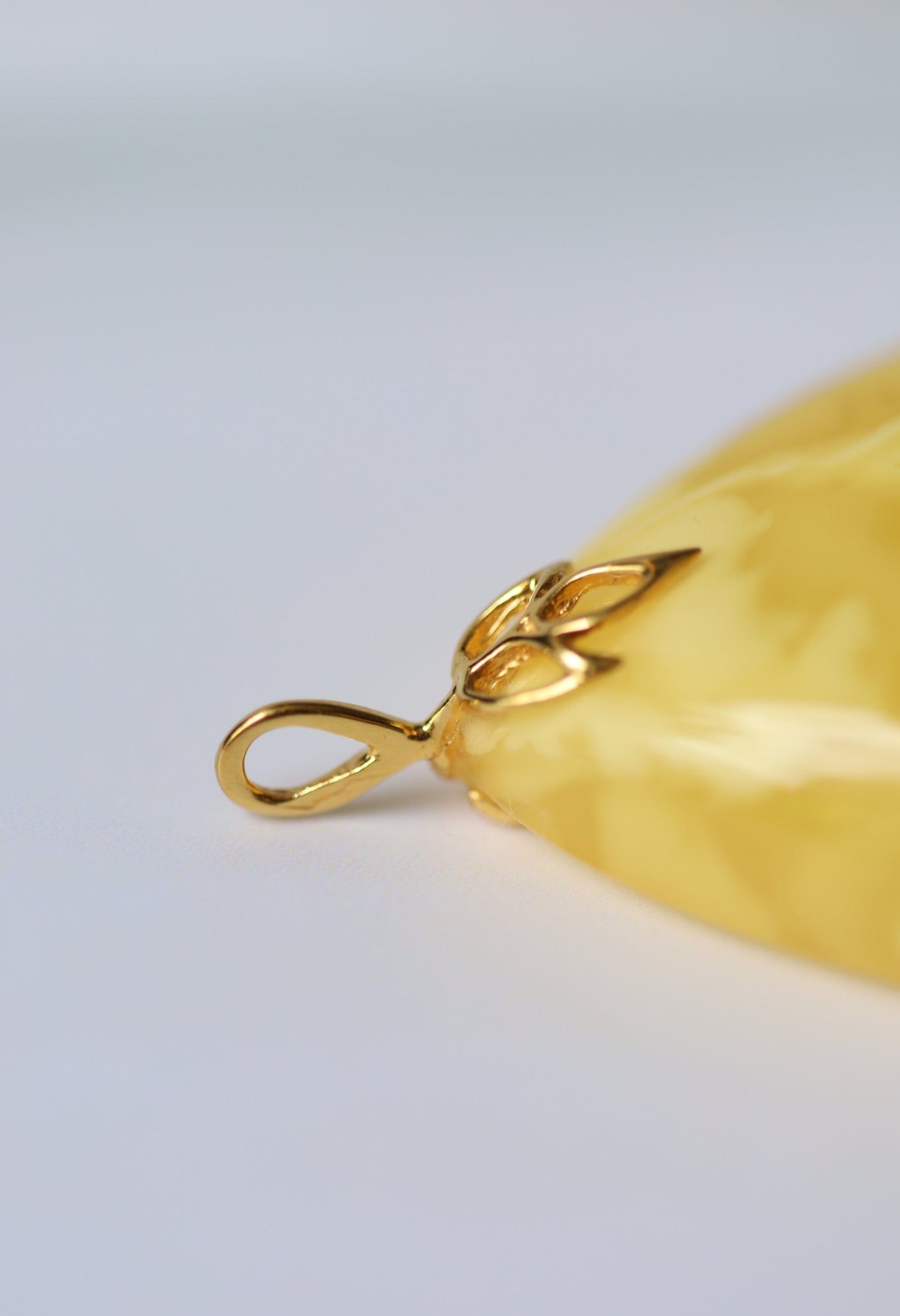 Natural Milk Amber Teardrop Shape Pendant in 14 Carat Gold