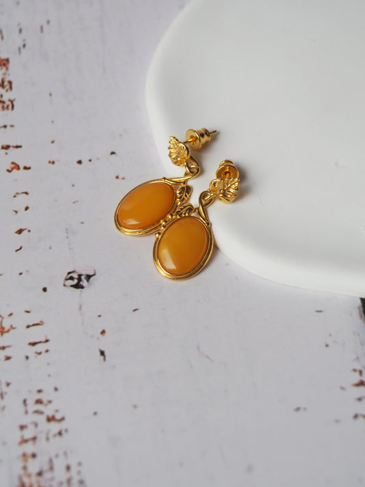 Honey Amber Oval Shape Dangling Earrings in Gold Plated Silver 925