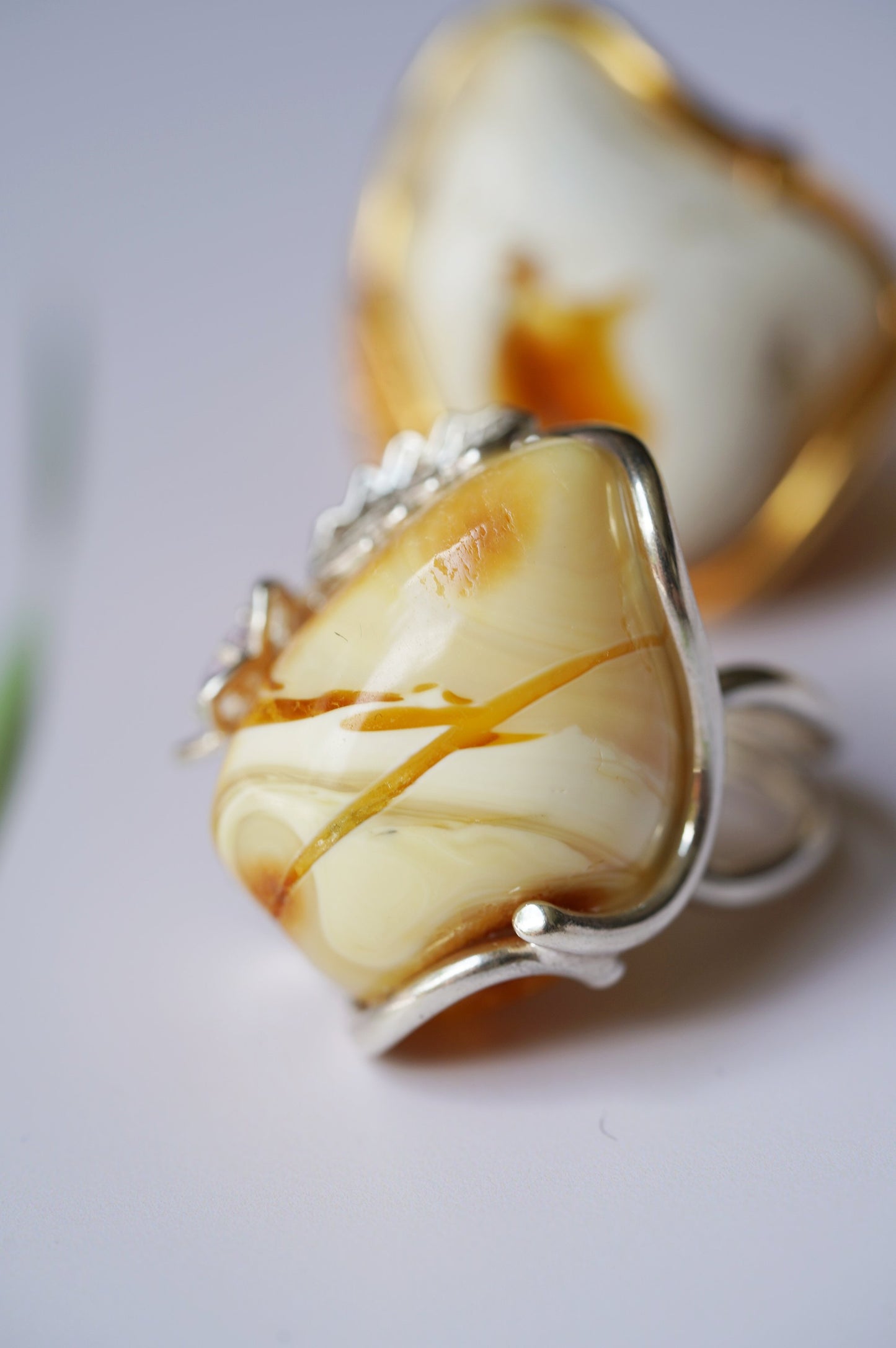Irregular Royal White Amber Ring With Silver Frame And Amethyst