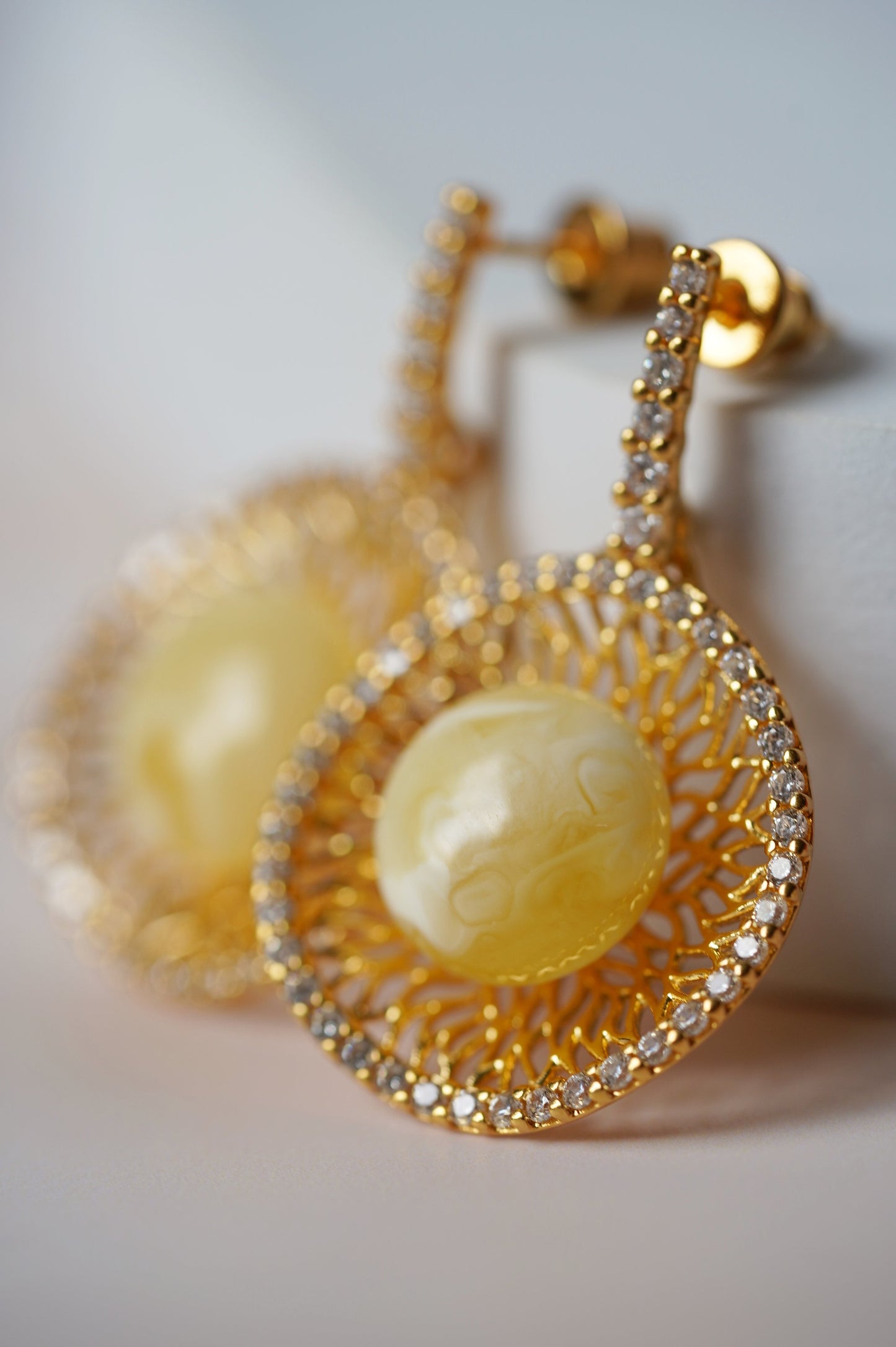Supertree inspired Dangling Stud Earrings with Royal White Amber and Cubic Zirconias in Gold Plated Silver