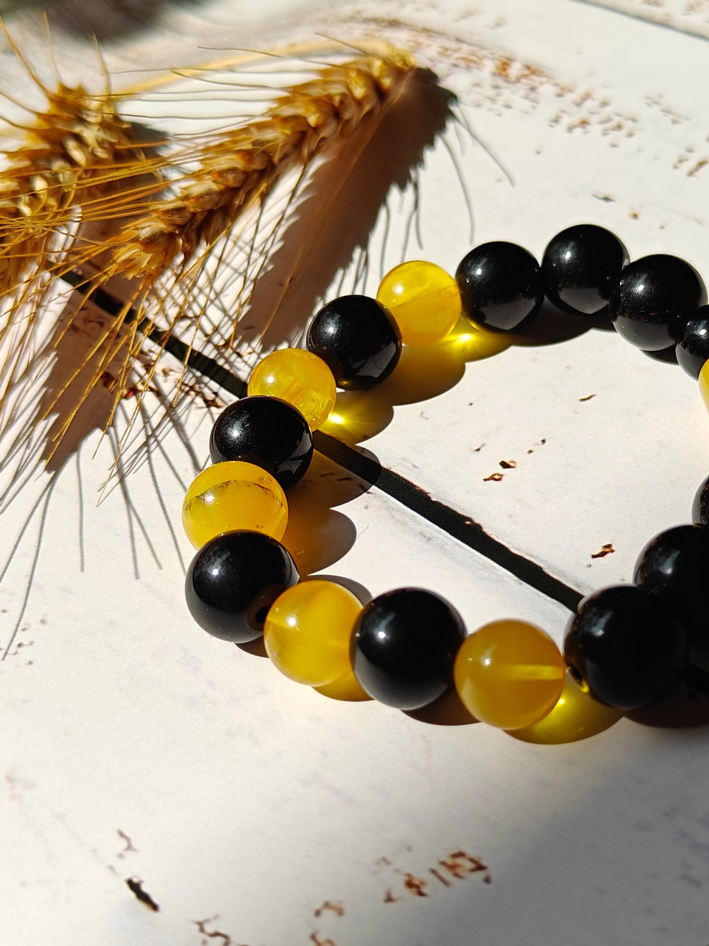 Black Onyx and Cloudy Baltic Amber Beaded Bracelet