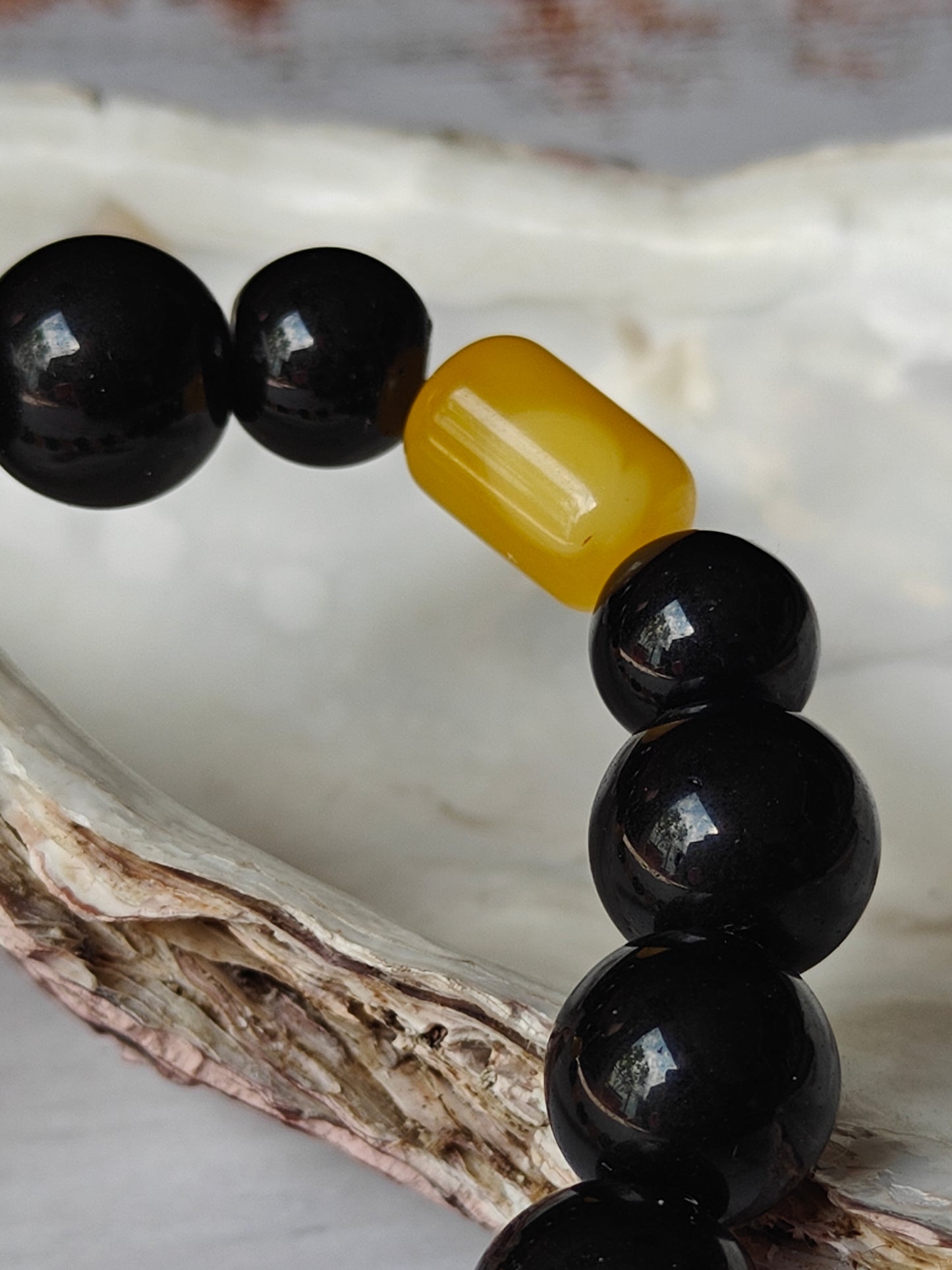 Black Onyx and Cloudy Baltic Amber Beaded Bracelet