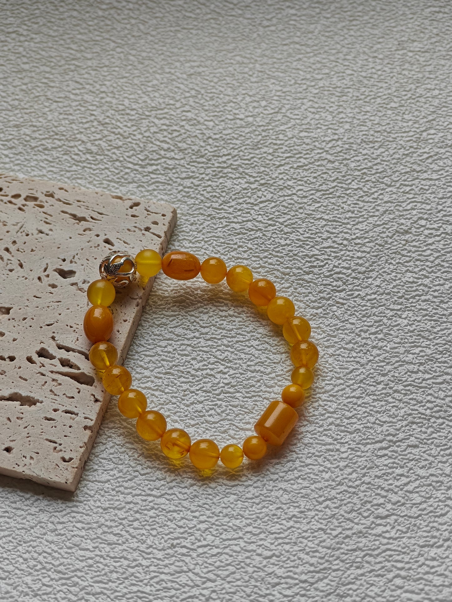 Aged Amber Beaded Bracelet with Silver Leaf Accent