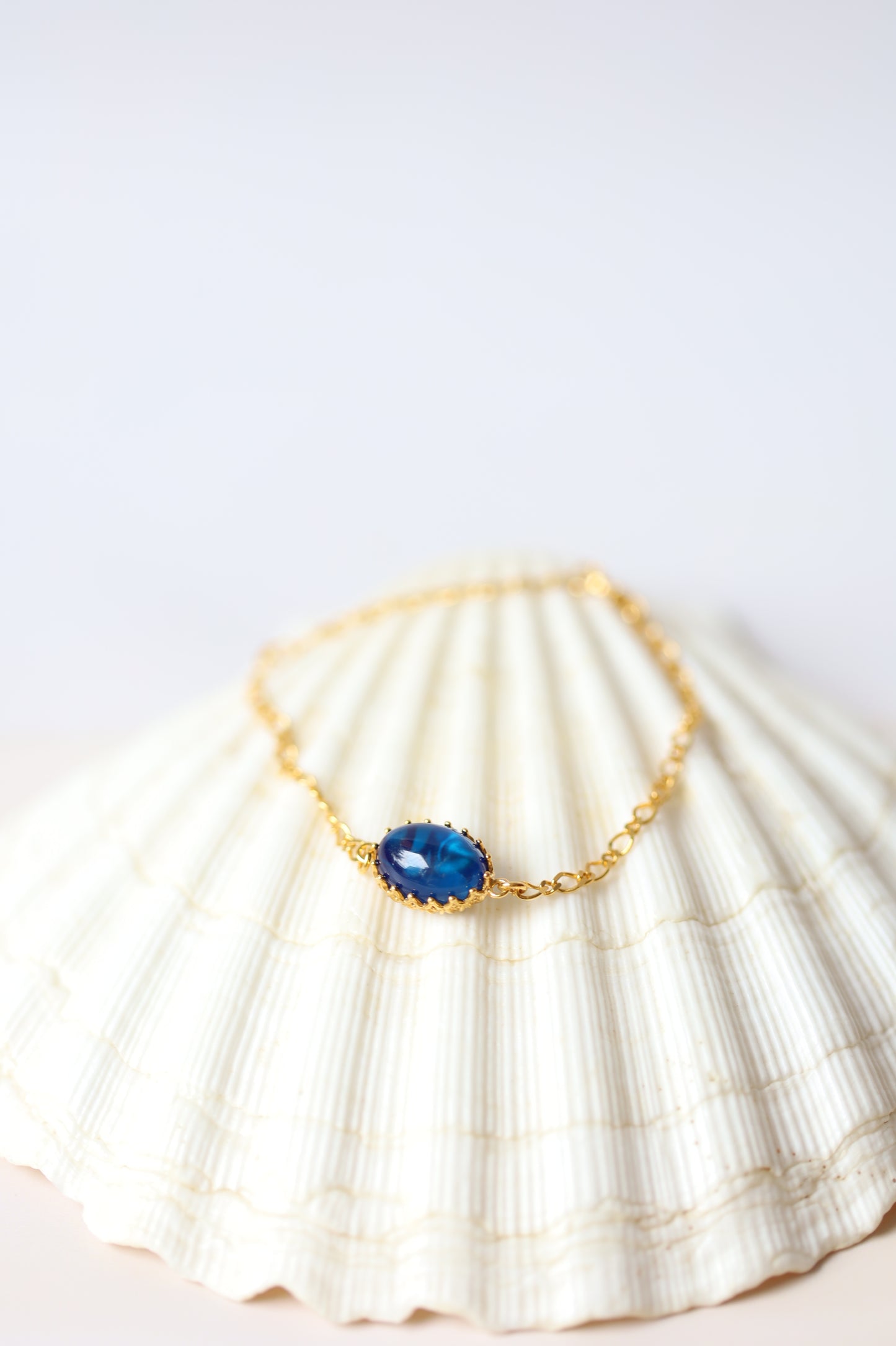 Olive Shape Blue Amber Chain Bracelet in Gold Plated Silver 925