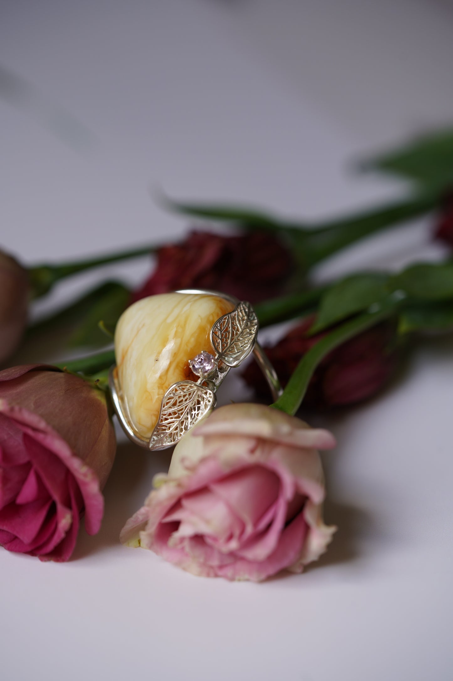 Irregular Royal White Amber Ring With Silver Frame And Amethyst