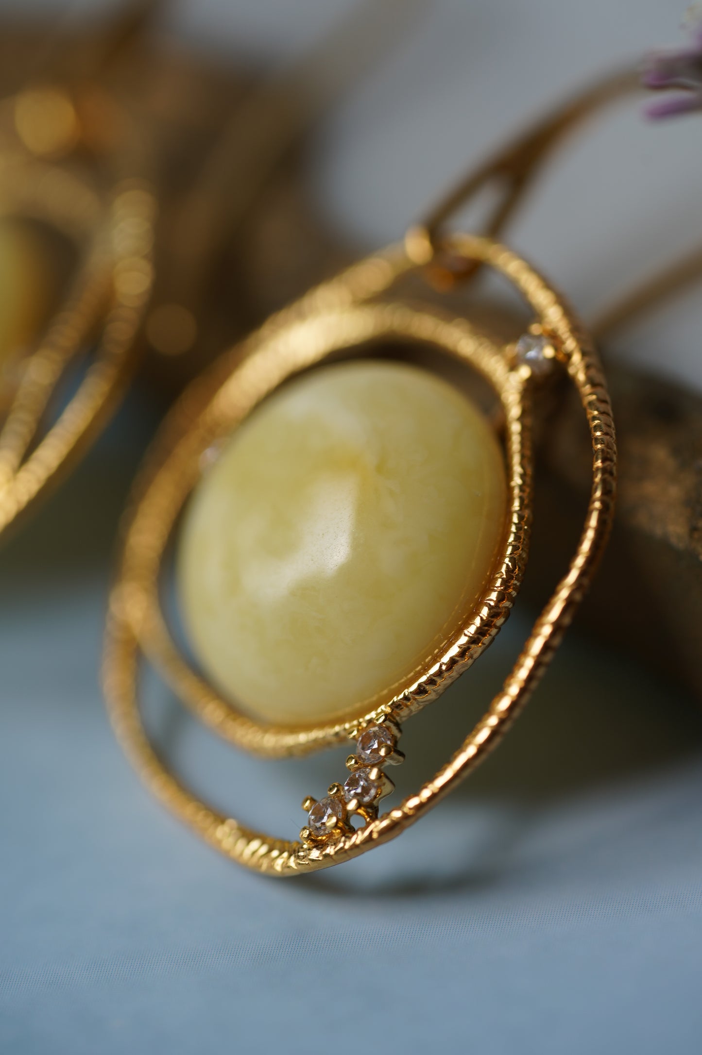 Delicate Round Irregular Royal White Amber Pendant with Cubic Zirconias in Gold Plated Silver
