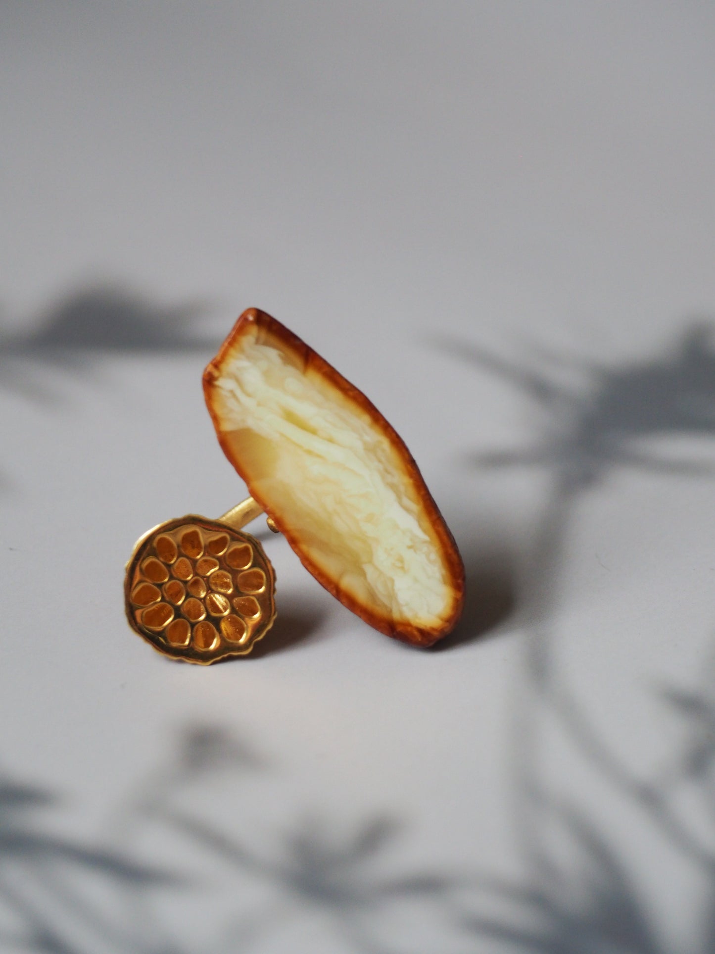 Unique Natural Amber Honeycomb Ring with Lotus Flower Pod and Matt Finish Gold Plated Silver