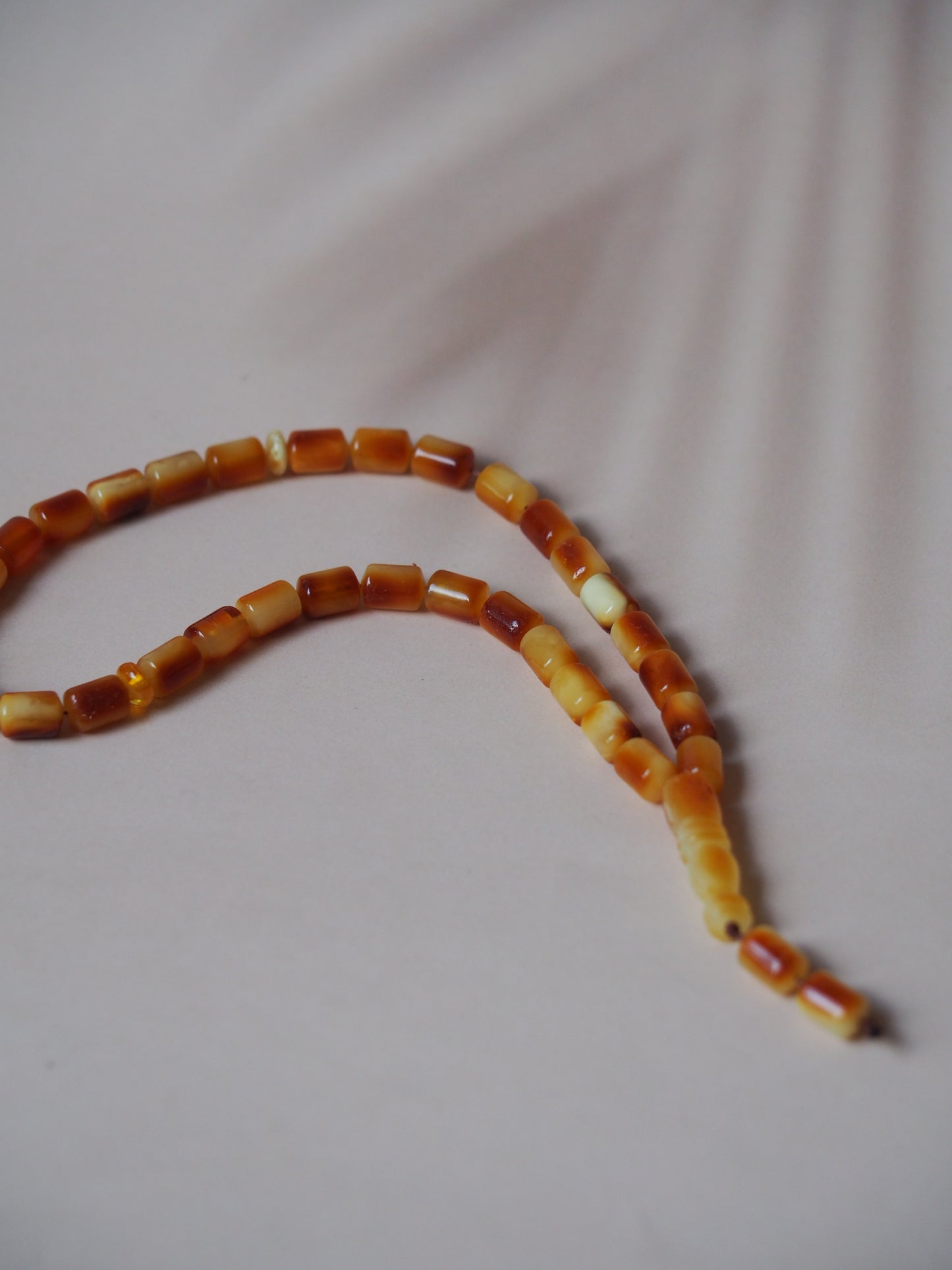 Oval Shape Red Amber Pendant in Gold Plated Silver