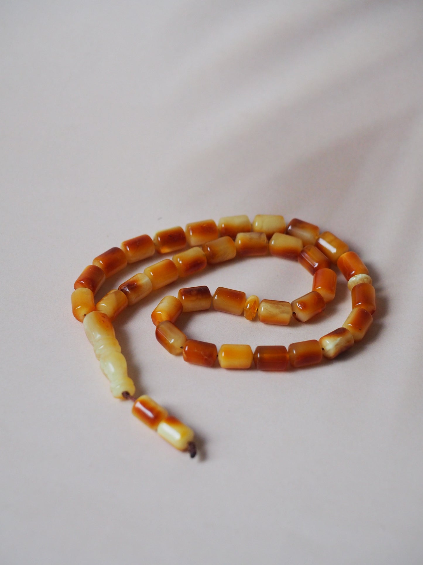 Oval Shape Red Amber Pendant in Gold Plated Silver