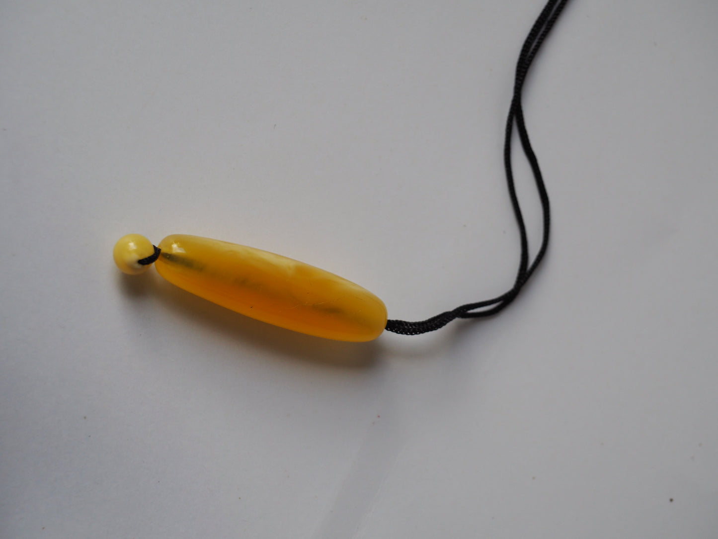 Natural Butterscotch/ Royal White Amber Oval Pendant with Ball