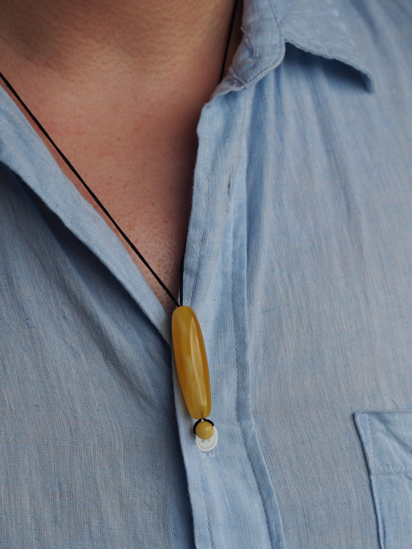 Natural Butterscotch/ Royal White Amber Oval Pendant with Ball