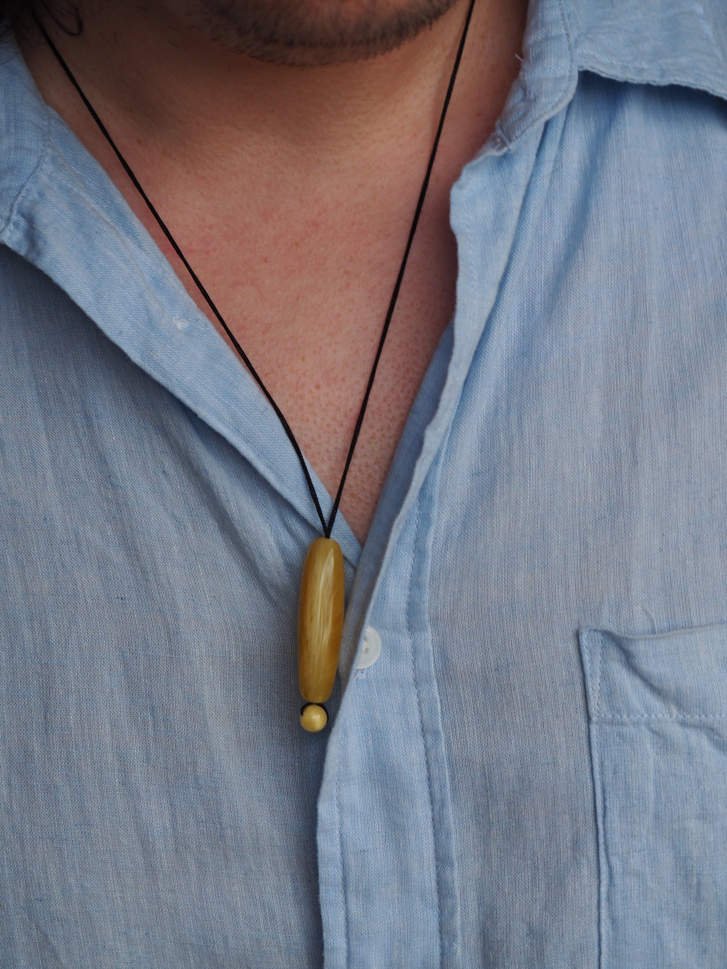 Natural Butterscotch/ Royal White Amber Oval Pendant with Ball
