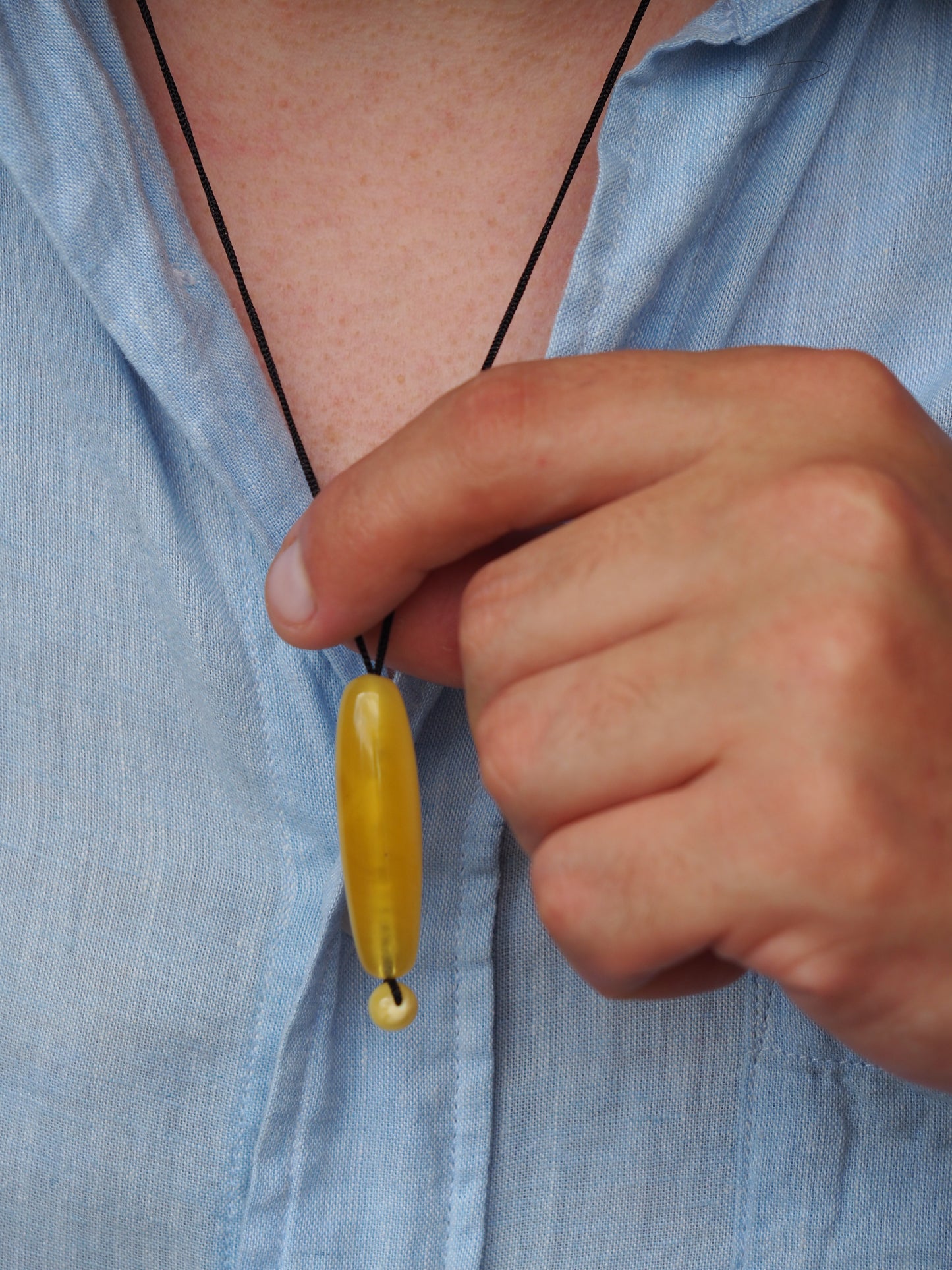 Natural Butterscotch/ Royal White Amber Oval Pendant with Ball