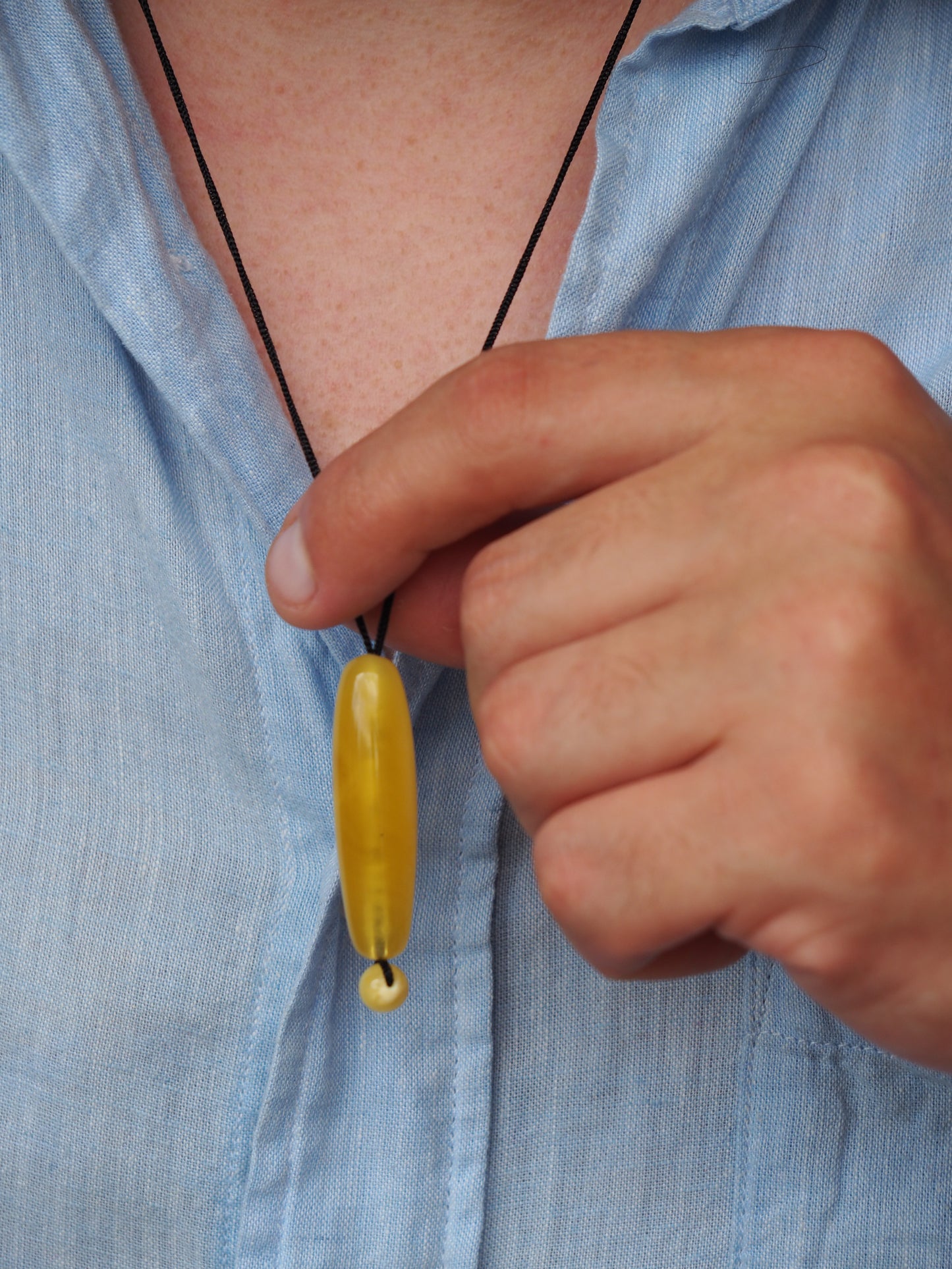 Natural Butterscotch/ Royal White Amber Oval Pendant with Ball