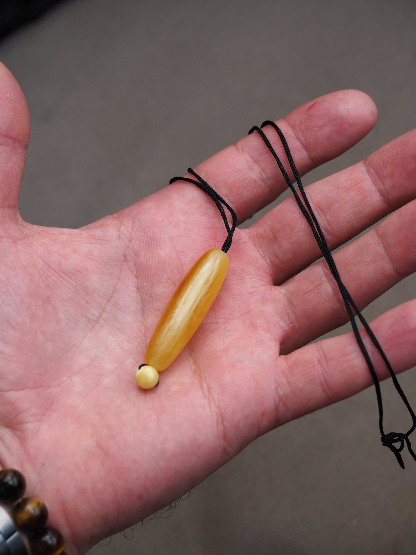 Natural Butterscotch/ Royal White Amber Oval Pendant with Ball