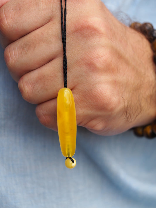 Natural Butterscotch/ Royal White Amber Oval Pendant with Ball