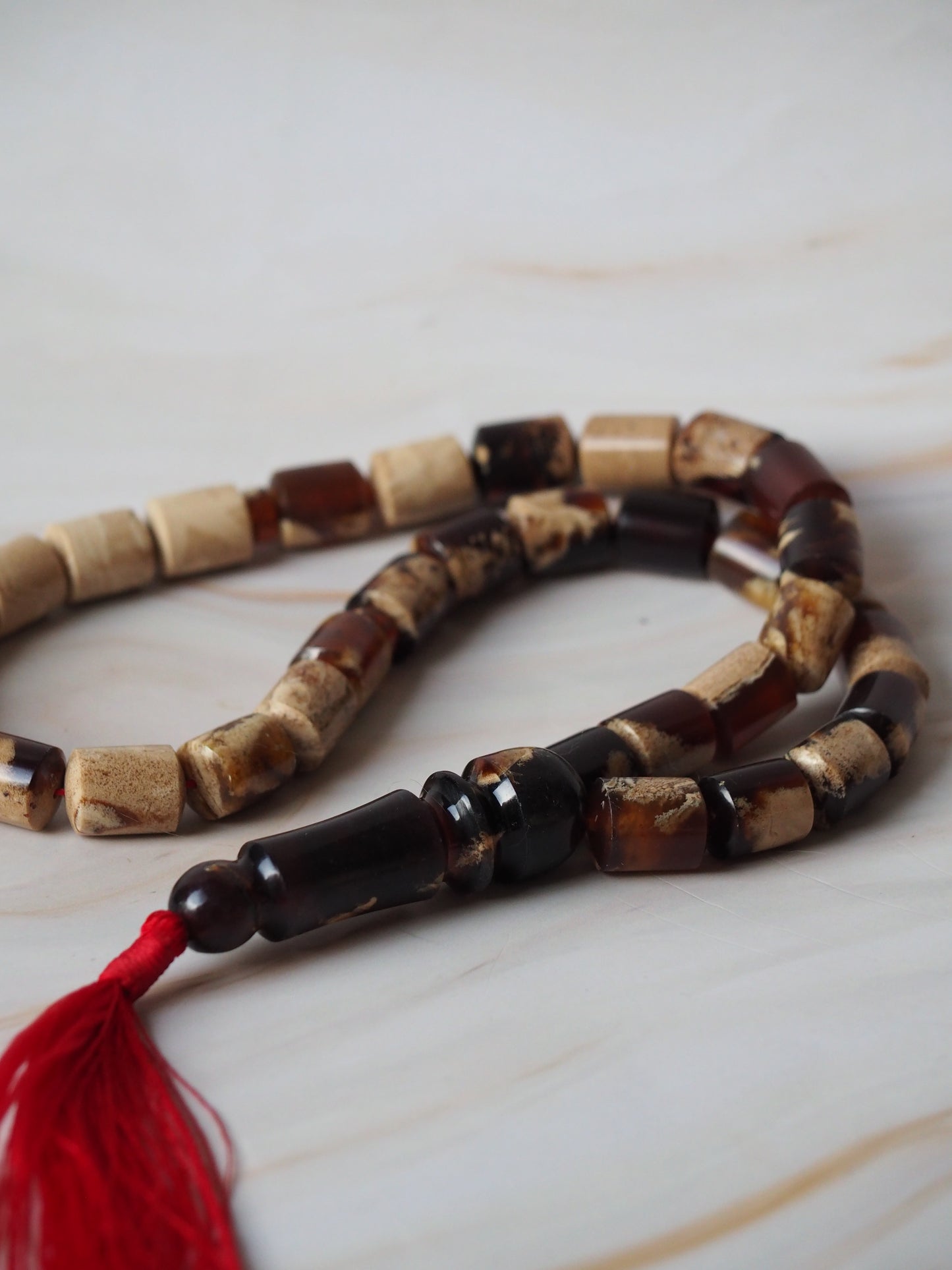 Indonesian Zebra/ Blue Amber Natural Barrel Shape Rosary 60,6g