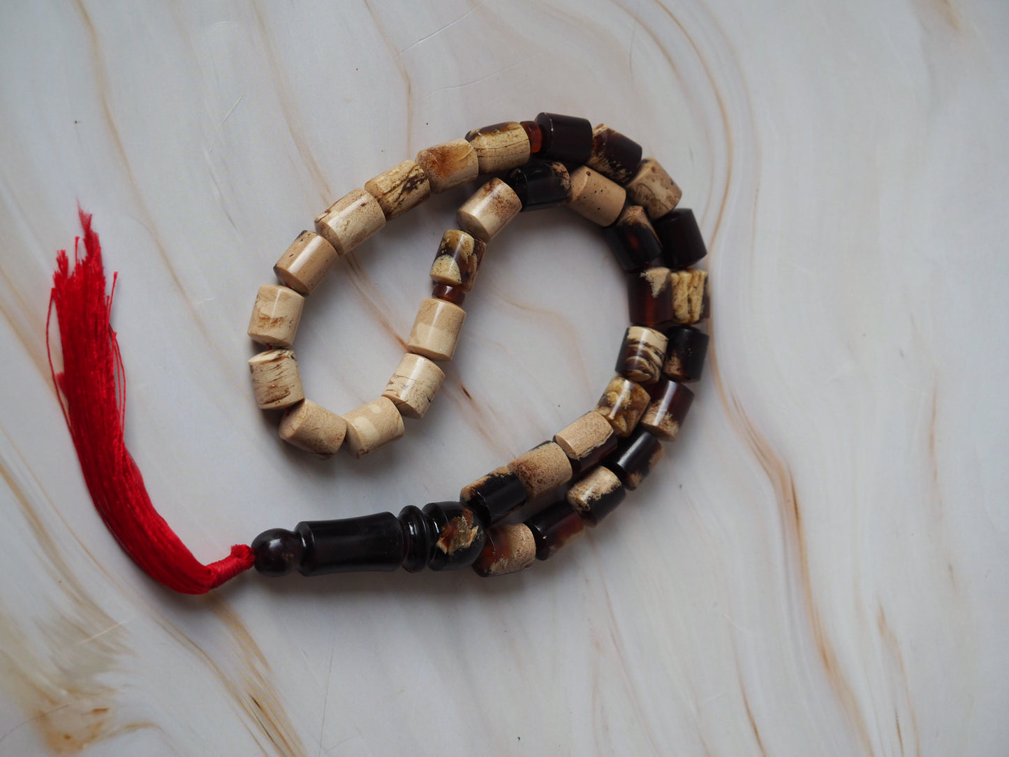 Indonesian Zebra/ Blue Amber Natural Barrel Shape Rosary 60,6g