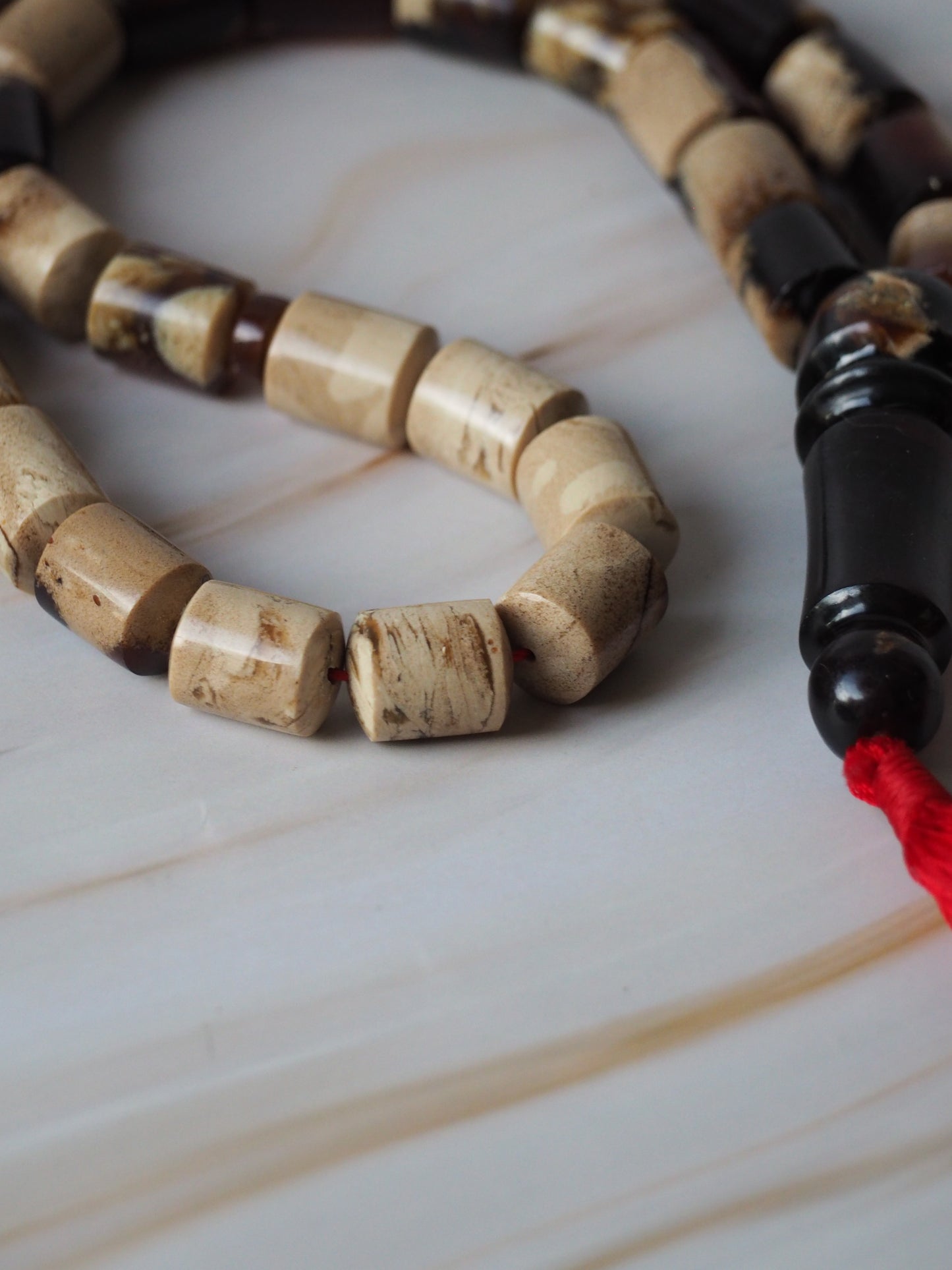 Indonesian Zebra/ Blue Amber Natural Barrel Shape Rosary 60,6g
