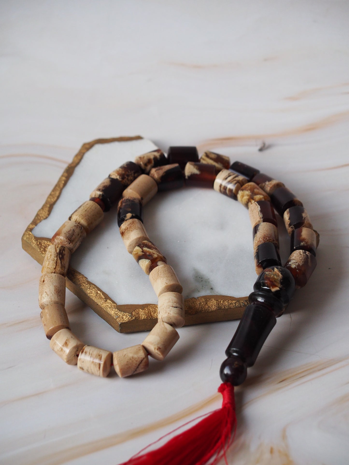 Indonesian Zebra/ Blue Amber Natural Barrel Shape Rosary 60,6g
