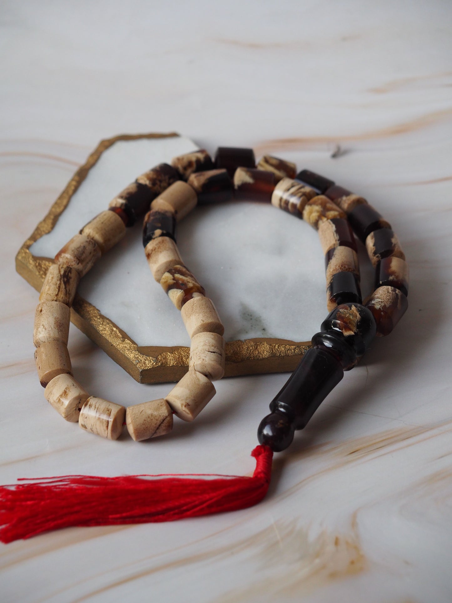 Indonesian Zebra/ Blue Amber Natural Barrel Shape Rosary 60,6g
