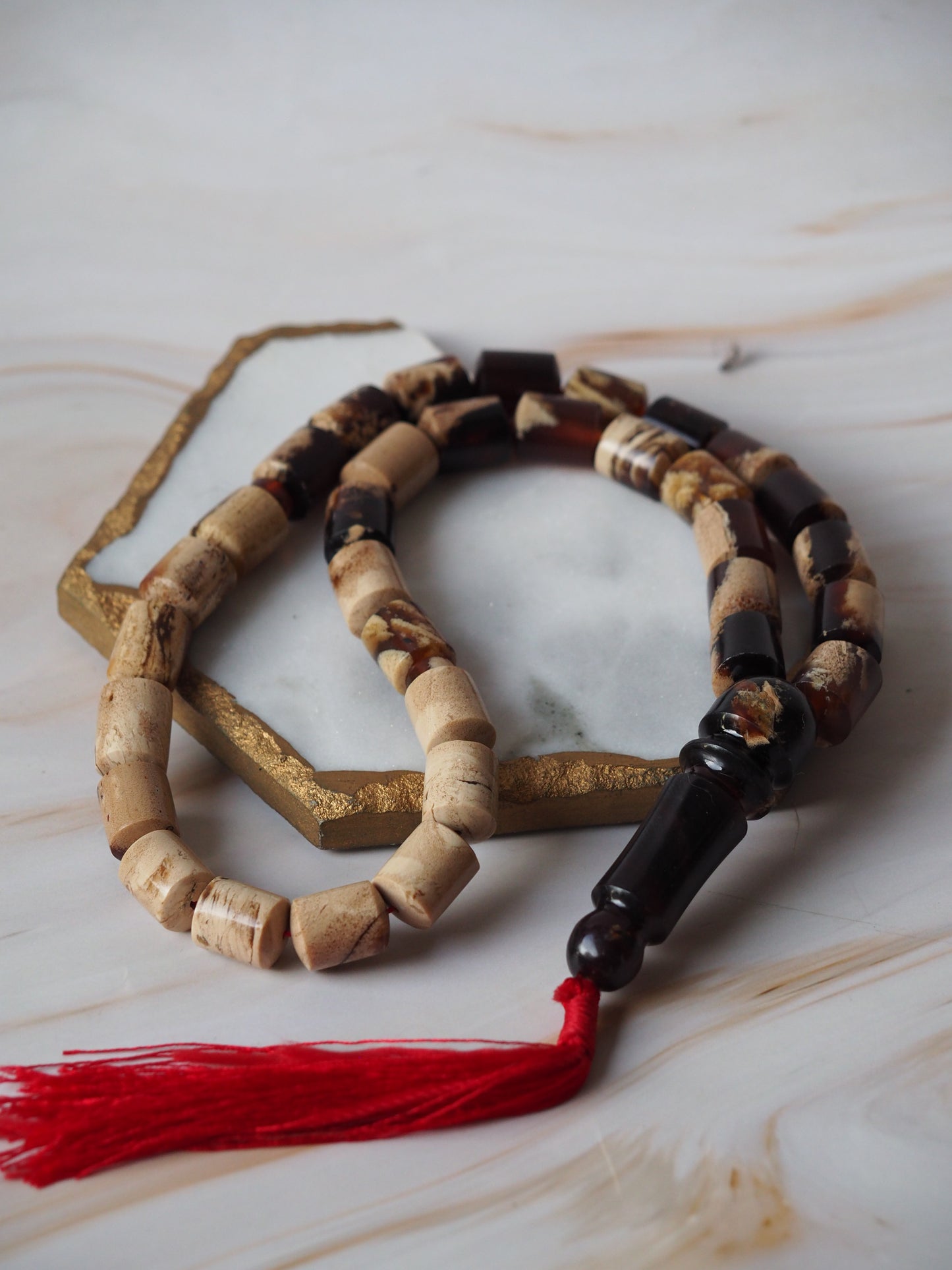 Indonesian Zebra/ Blue Amber Natural Barrel Shape Rosary 60,6g