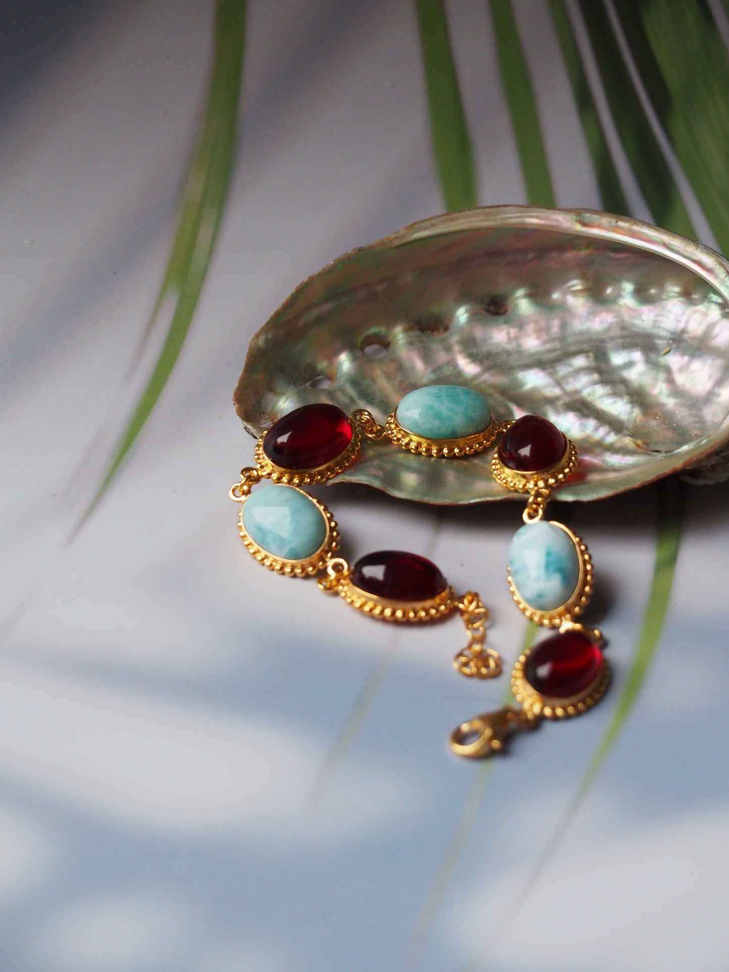 Red Amber and Larimar Bracelet in Gold Plated Silver