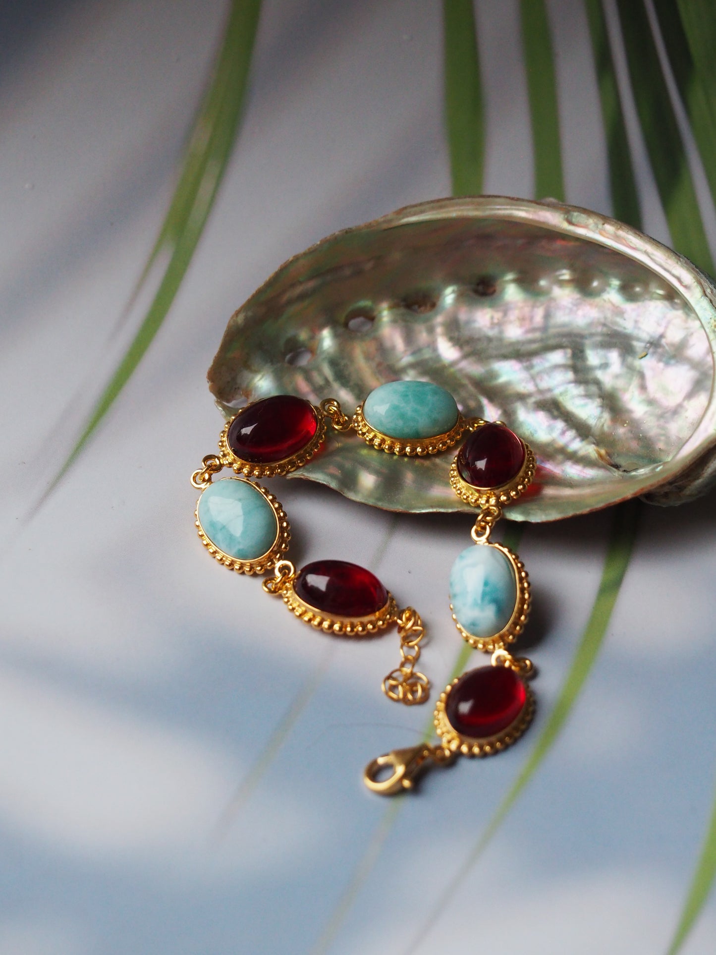 Red Amber and Larimar Bracelet in Gold Plated Silver