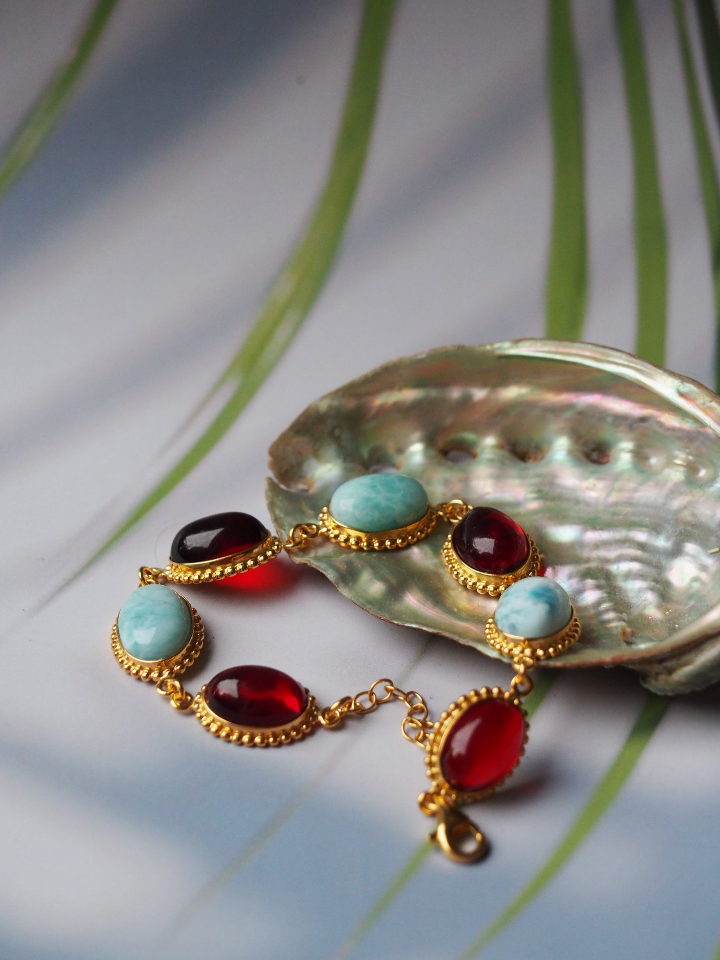 Red Amber and Larimar Bracelet in Gold Plated Silver