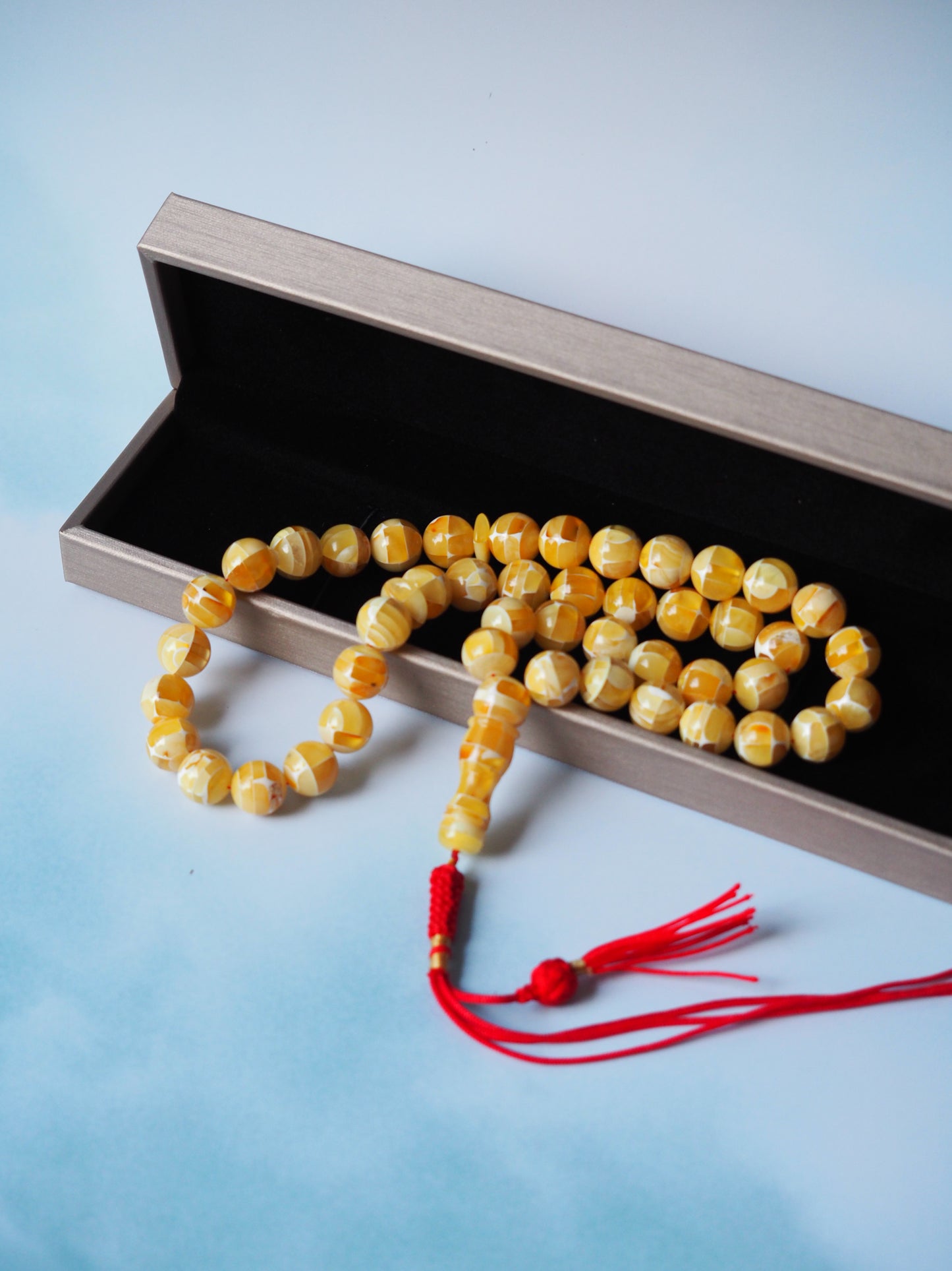Bright Blue Amber Pendant in Gold Plated Silver