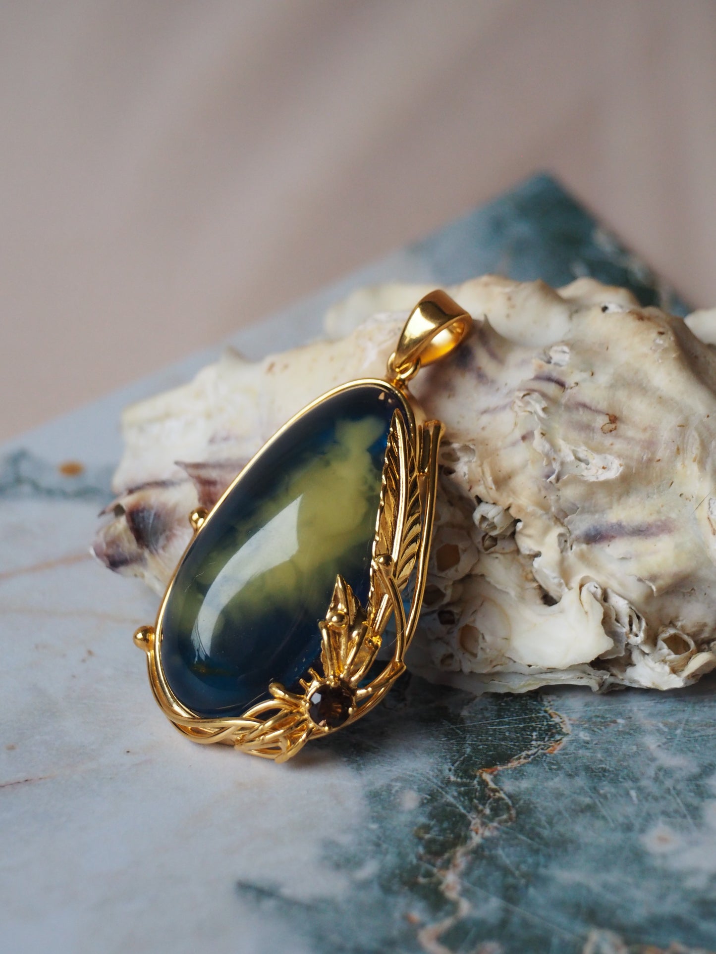 Unique Blue Amber Pendant with Milk Inclusion and Amethyst in Gold Plated Silver
