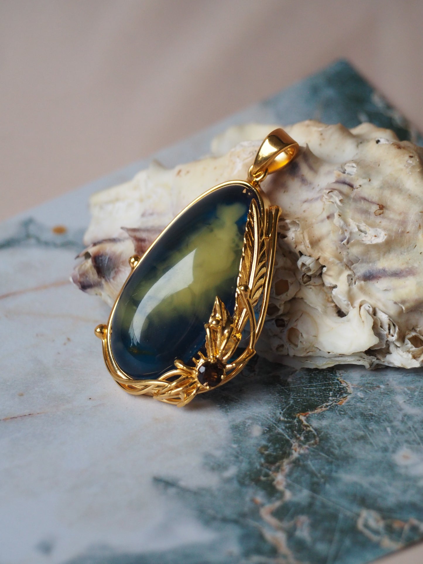 Unique Blue Amber Pendant with Milk Inclusion and Amethyst in Gold Plated Silver
