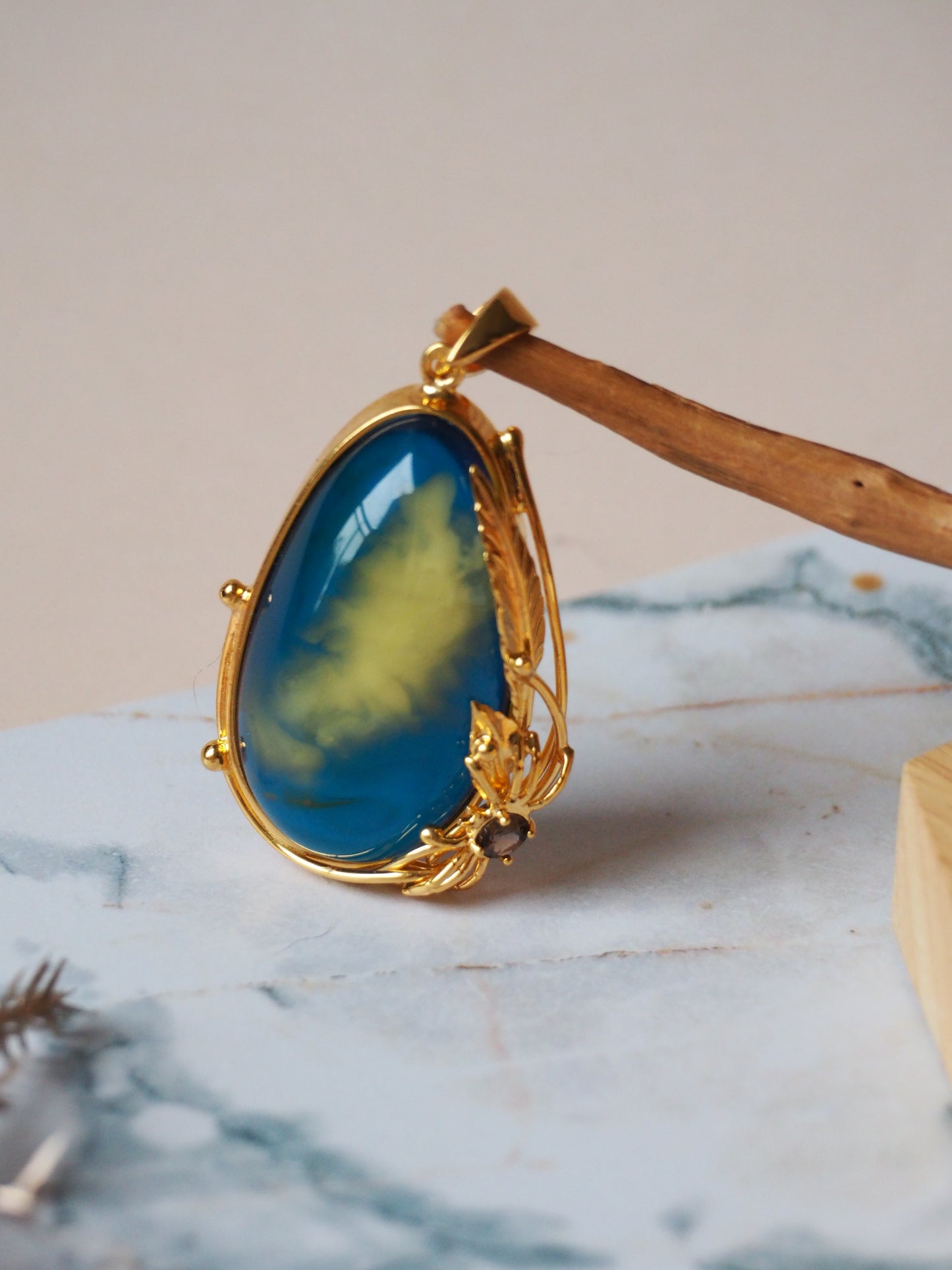 Unique Blue Amber Pendant with Milk Inclusion and Amethyst in Gold Plated Silver