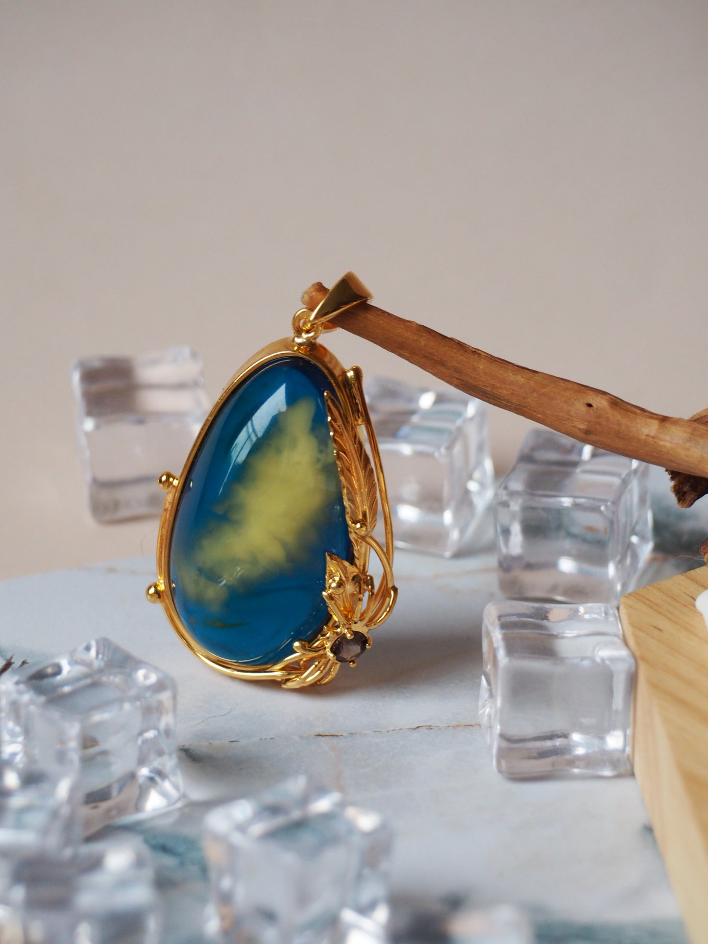 Unique Blue Amber Pendant with Milk Inclusion and Amethyst in Gold Plated Silver