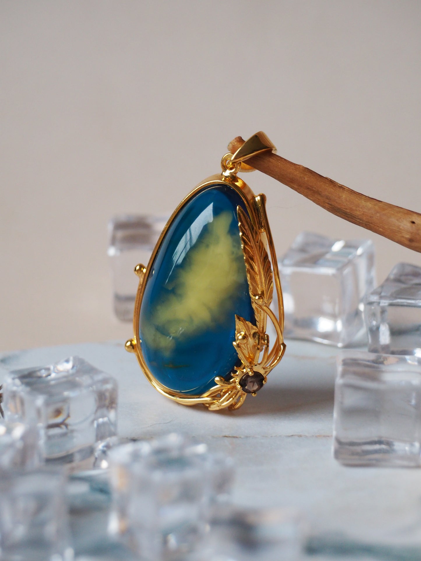Unique Blue Amber Pendant with Milk Inclusion and Amethyst in Gold Plated Silver