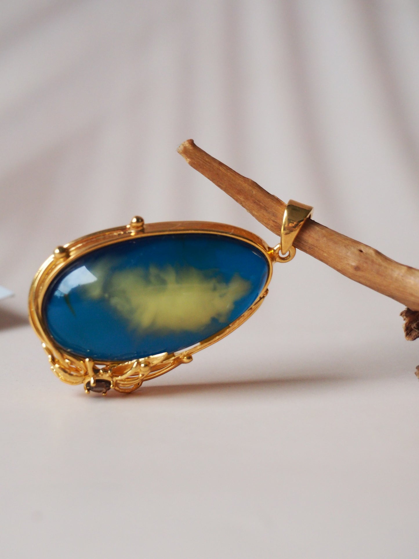 Unique Blue Amber Pendant with Milk Inclusion and Amethyst in Gold Plated Silver
