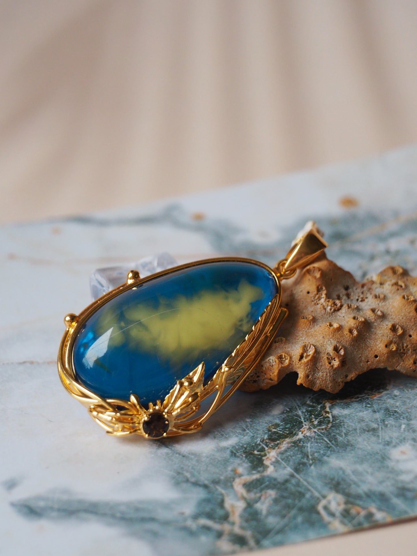 Unique Blue Amber Pendant with Milk Inclusion and Amethyst in Gold Plated Silver