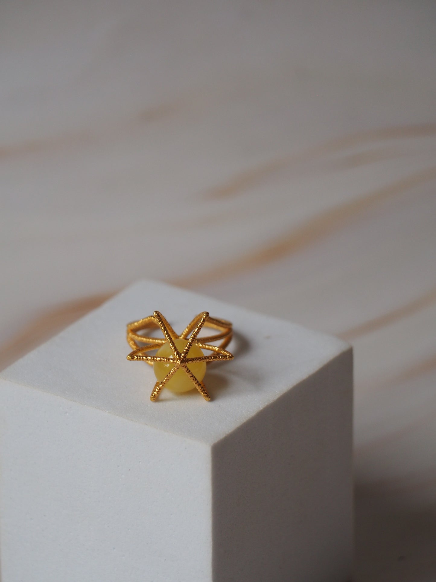 Geometric Cage Ring With Butterscotch Amber And Gold Plated Silver