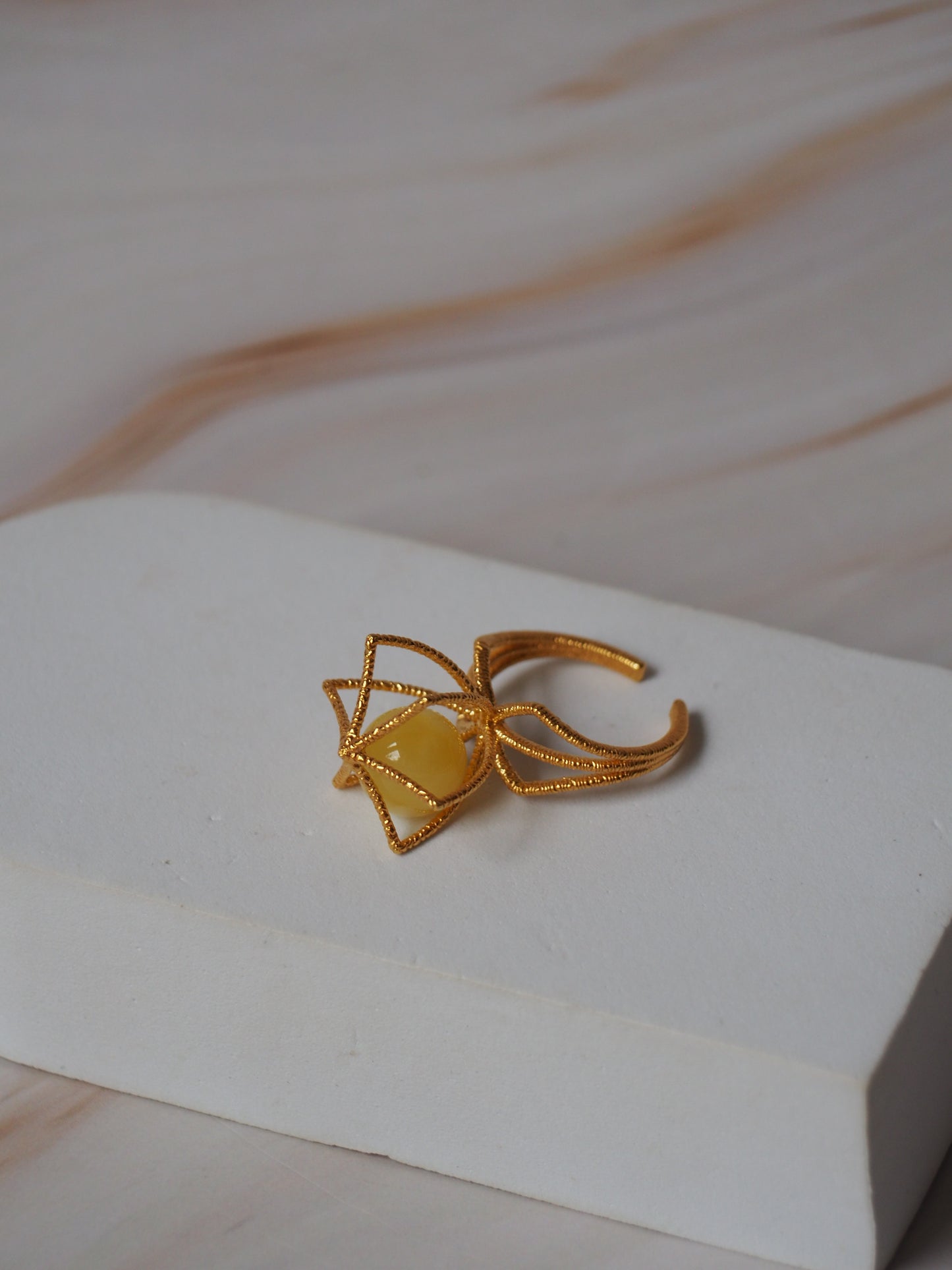 Geometric Cage Ring With Butterscotch Amber And Gold Plated Silver