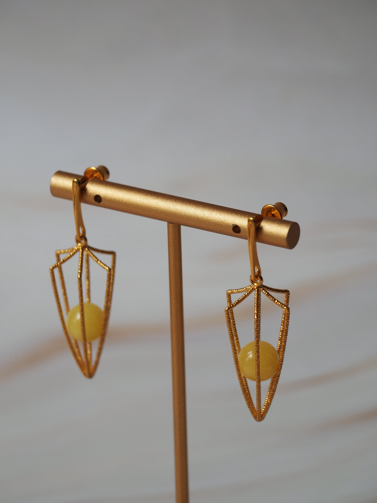 Geometric Cage Earrings With Butterscotch Amber And Gold Plated Silver