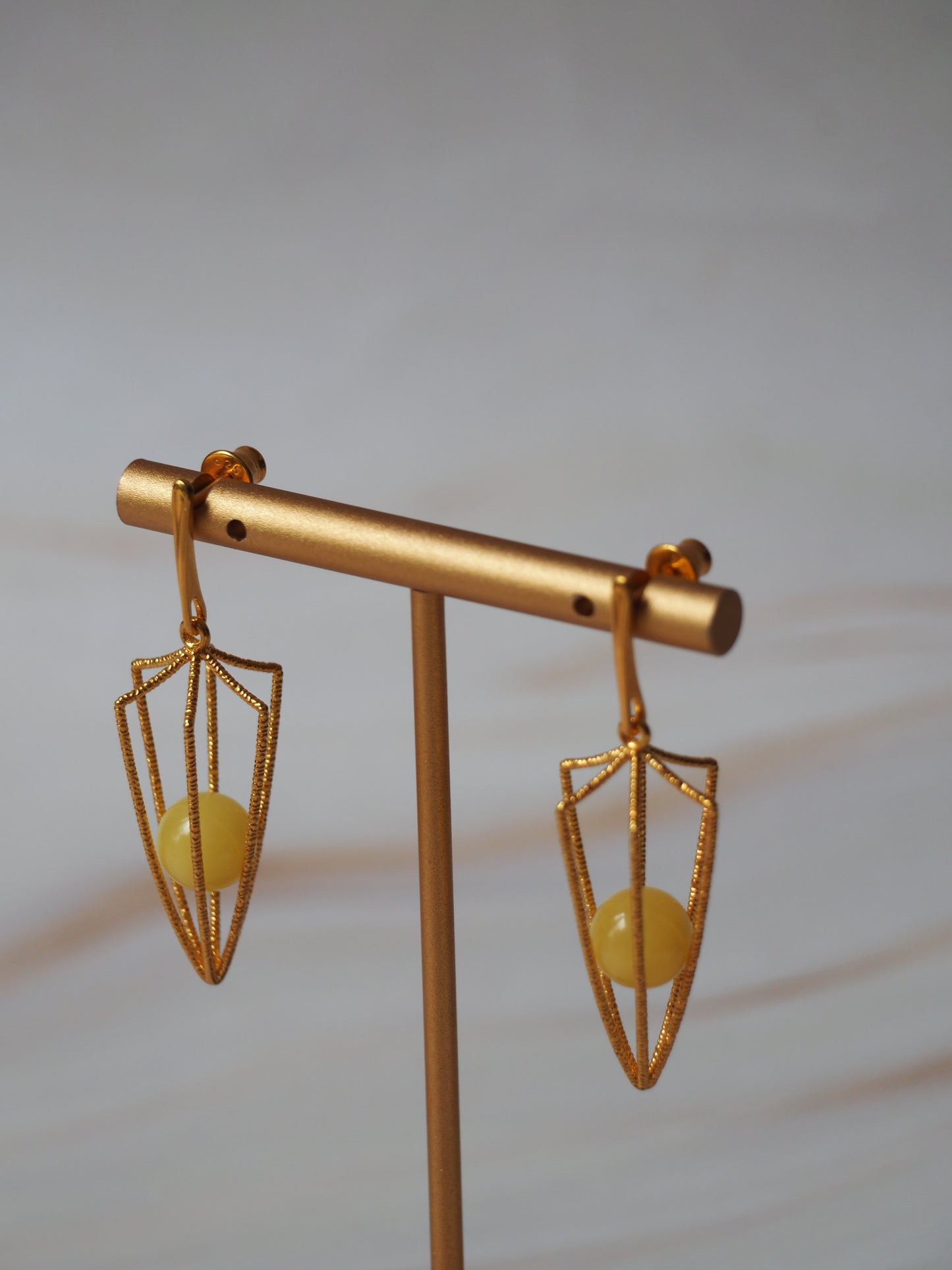 Geometric Cage Earrings With Butterscotch Amber And Gold Plated Silver