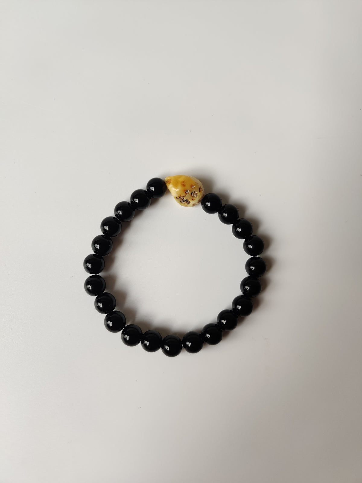 Black Onyx & Rare White Amber Bracelet